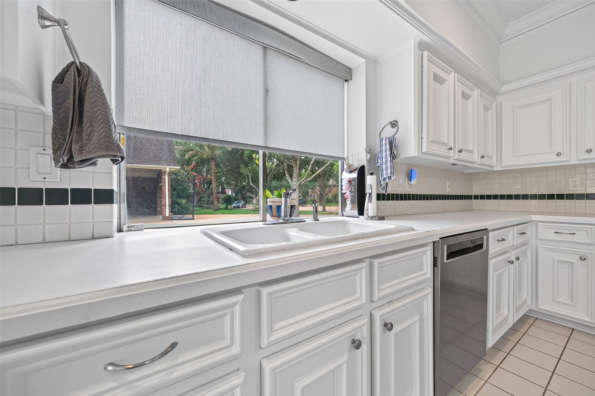 18 Tredington Street, Sugar Land, TX 77479 Gaze out into the window while at the sink.