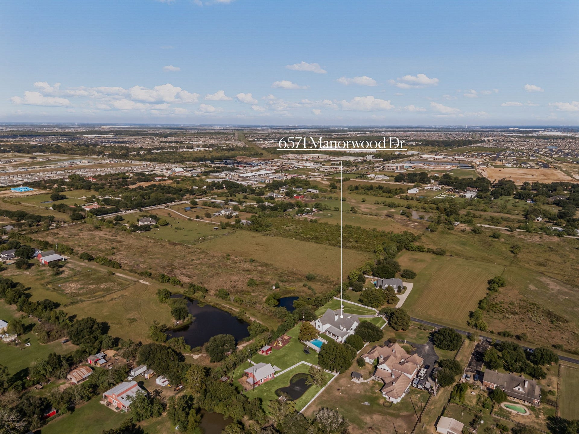 6571 Manorwood Drive, Katy, TX 77493 This expansive regional aerial showcases the exceptional location of 6571 Manorwood Dr, offering peaceful country privacy while staying minutes from everything Katy has to offer. Only minutes away from HEB, schools, local parks, pharmacies, Texas Typhoon water park, Katy Mills Mall shopping and Katy Asian Town dining.