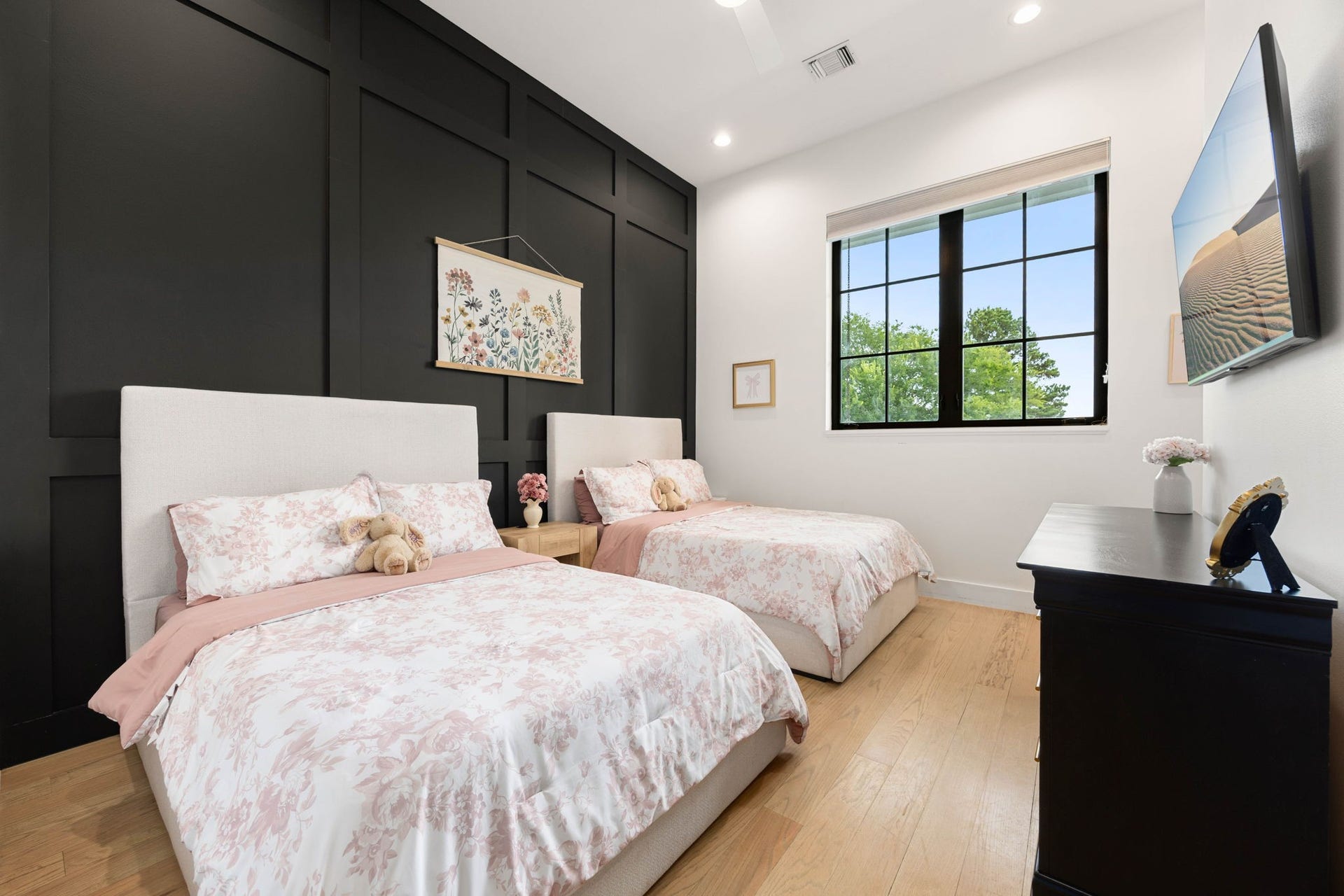 6571 Manorwood Drive, Katy, TX 77493 Perfectly positioned on the main level for ultimate convenience, this second bedroom down highlights the homes consistent use of custom millwork, premium flooring, and high-end construction materials.