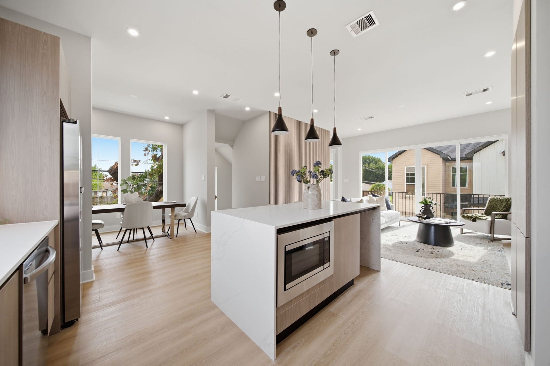 Large waterfall island with breakfast bar