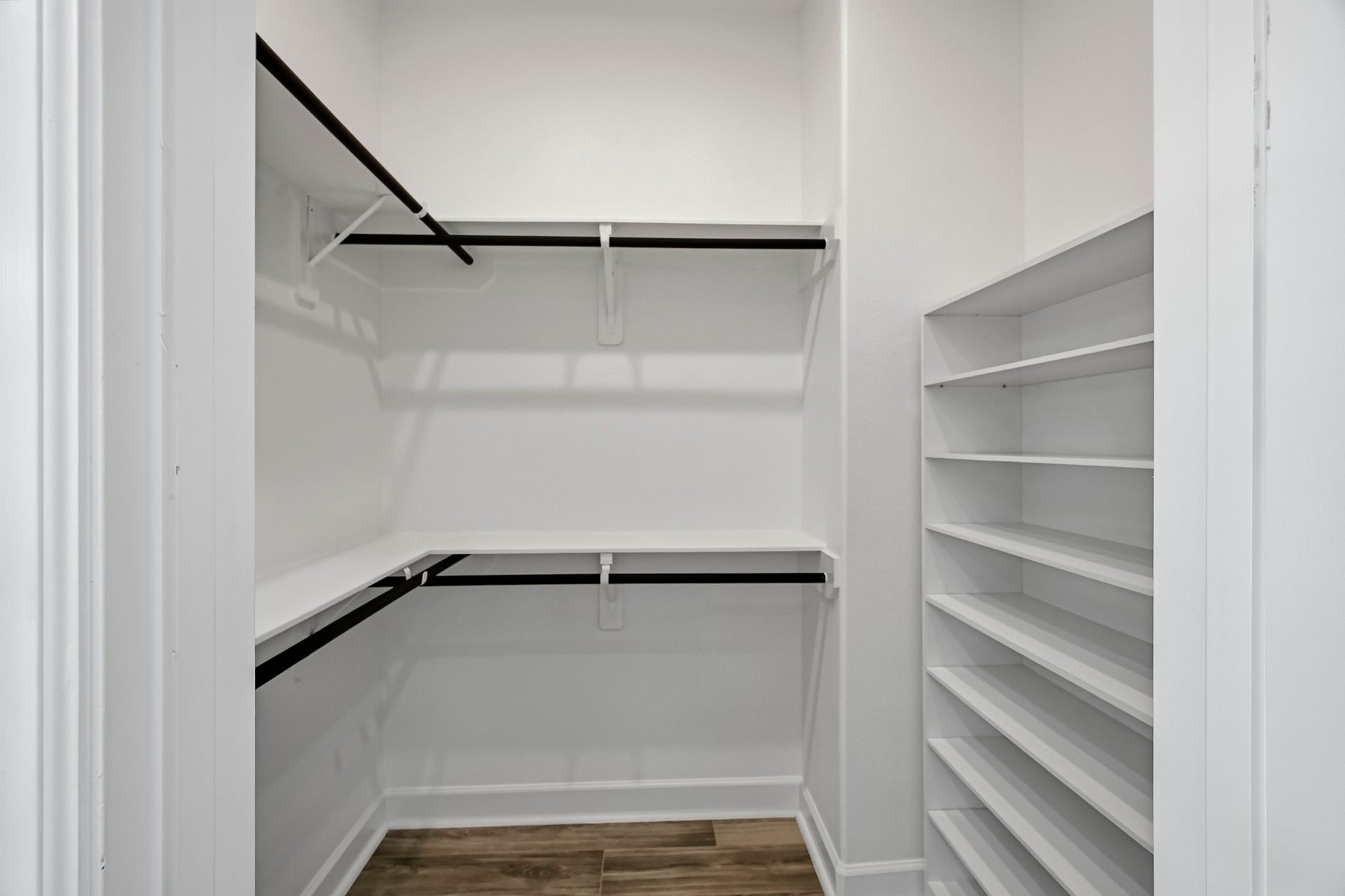 24919 Hibiscus Garden Way, Katy, TX 77493 Floor-to-ceiling organization and generous proportions define this highly functional dressing retreat. Multi-level hanging rods and modular shelving maximize usable square footage while maintaining an open, accessible spatial flow.