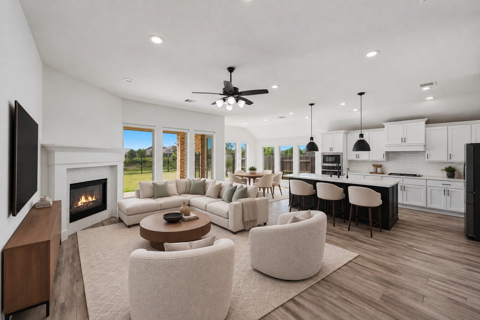 24919 Hibiscus Garden Way, Katy, TX 77493 Virtually Staged: A sense of boundless depth defines this open pavilion layout, anchored by a corner hearth that naturally centers the room.