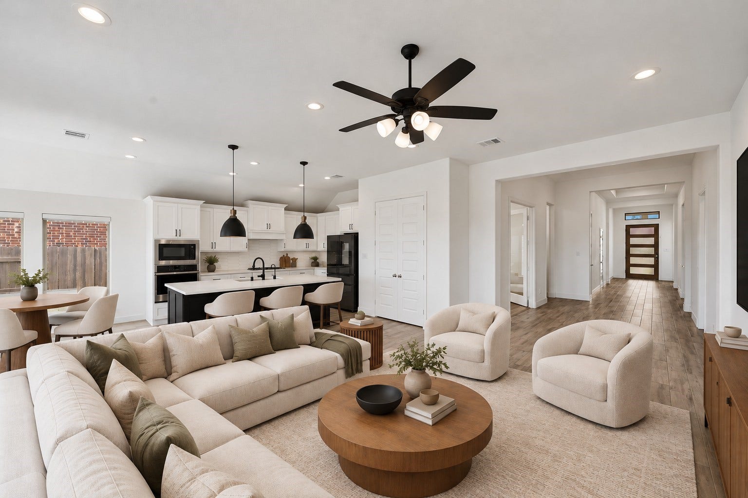 24919 Hibiscus Garden Way, Katy, TX 77493 Virtually Staged: Generous spatial proportions define this expansive central layout, highlighted by an airy ceiling design and a seamless transition into the kitchen zone.