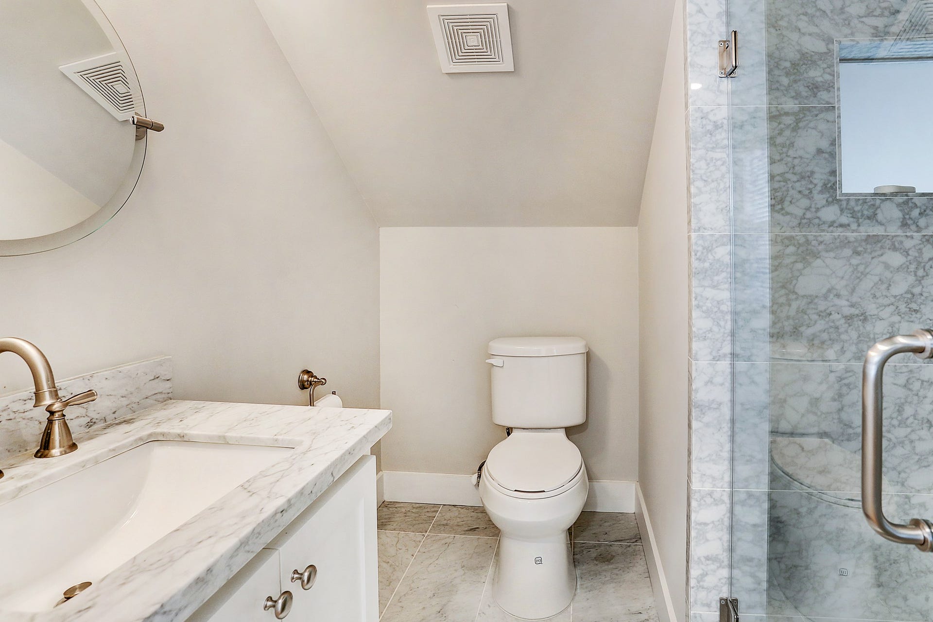 Guest quarters' full bath with standing shower.
