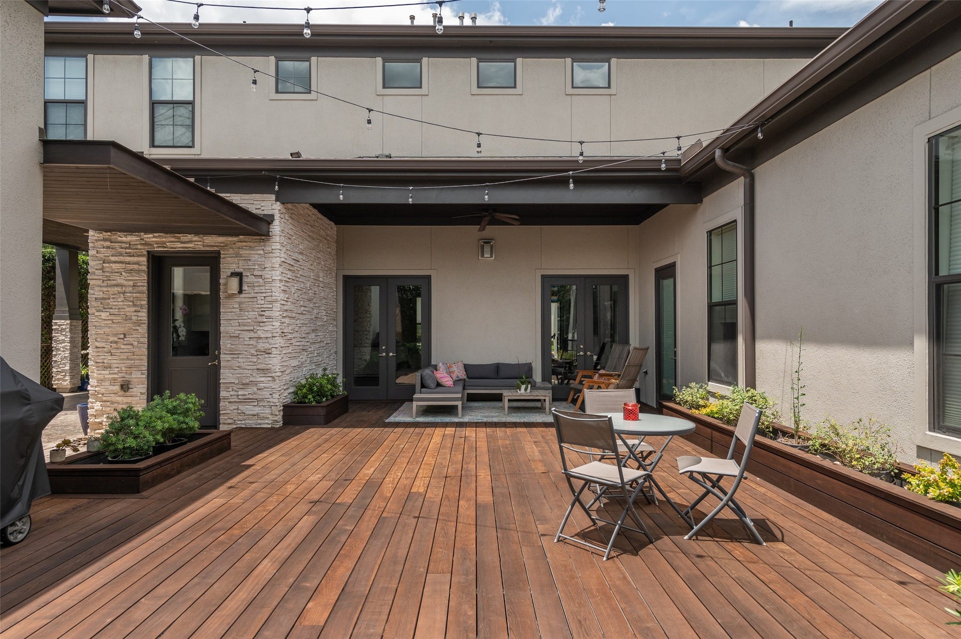 Wood deck is great for entertaining and child's play.