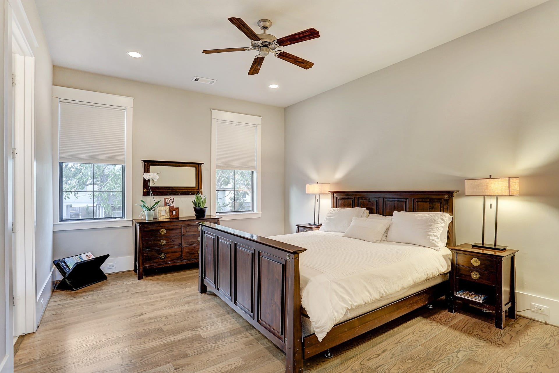 13x15 2nd bedroom upstairs has walk in closet with custom built ins, ceiling fan, recessed lighting, light filtering adjustable window shades and ensuite bath.