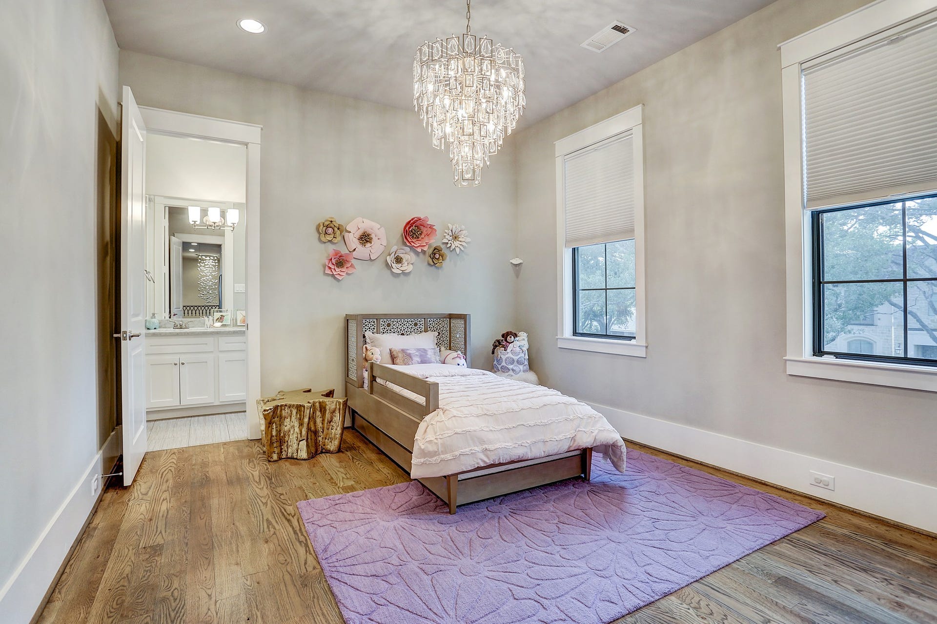 11x13 3rd bedroom upstairs has walk in closet with custom built ins, chandelier, recessed lighting, adjustable shades and ensuite bath.