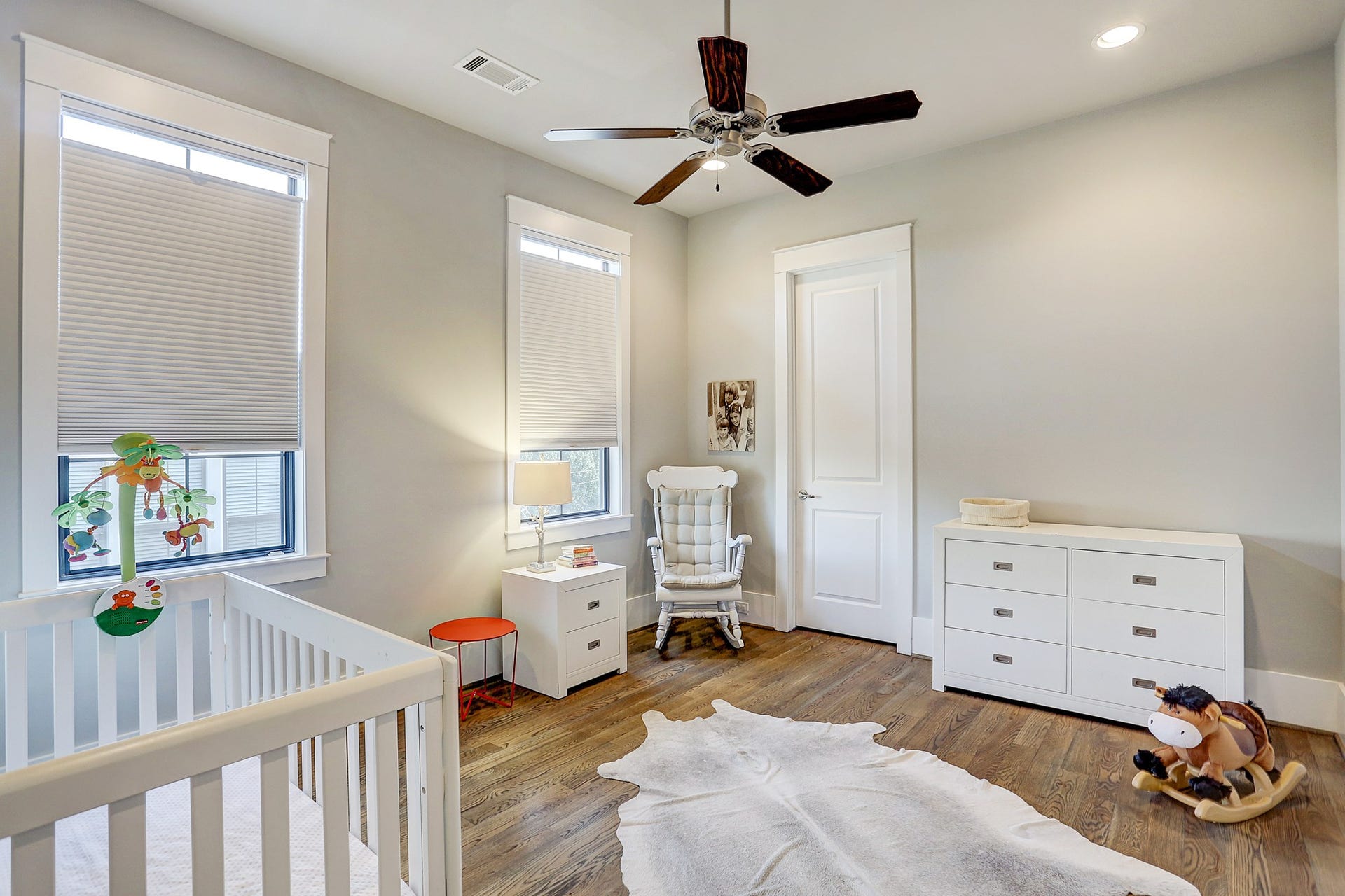 11x13 4th bedroom upstairs has walk in closet, ceiling fan, recessed lighting, and adjustable shades.