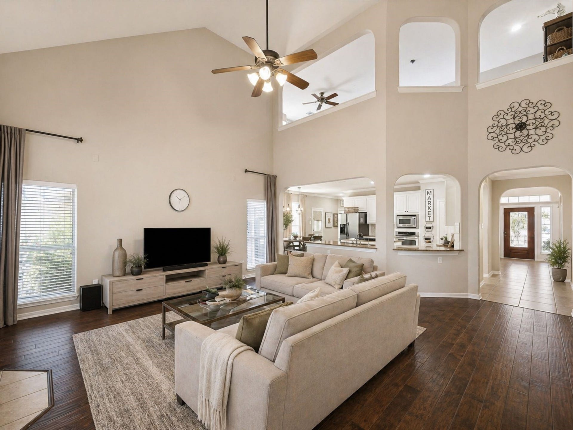 2202 SUMMER WIND DRIVE, Sugar Land, TX 77479 OPEN-CONCEPT DESIGN WITH CLEAR SIGHTLINES FROM THE LIVING ROOM INTO THE KITCHEN AND ENTRY. **Virtually Staged.