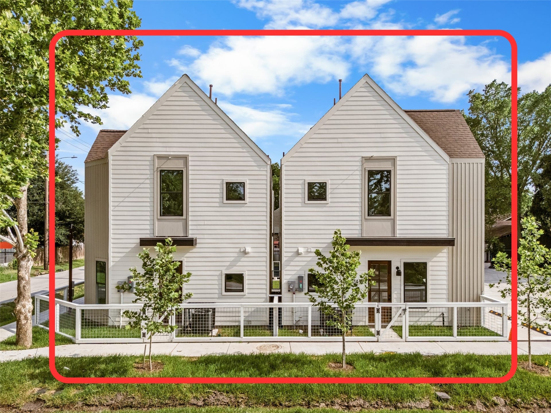 7432 & 7444 Tremper Street, Houston, TX 77020 Perfectly symmetrical rear facades complete with young shade trees and neat fencing.