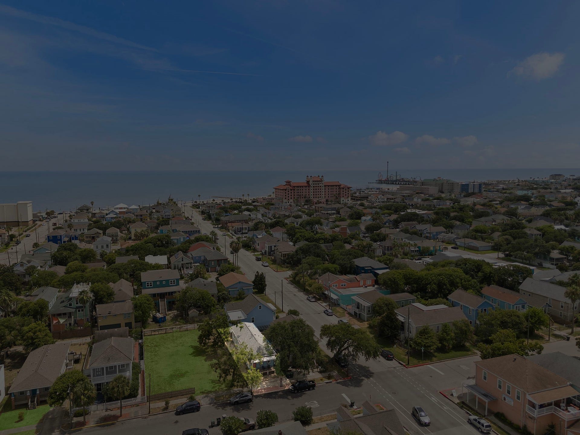 1825 Avenue N Street, Galveston, TX 77550 Side aerial of home.