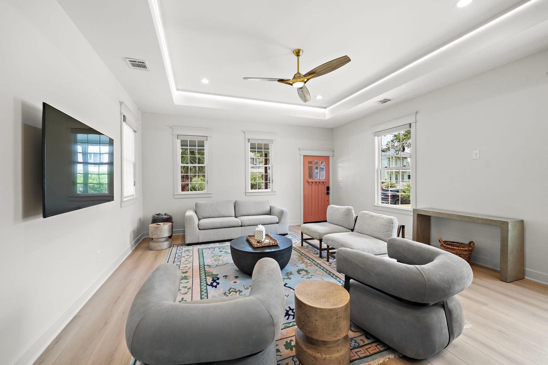 1825 Avenue N Street, Galveston, TX 77550 View of living room, front door, recessed rope lighting, and Four Hands furniture.