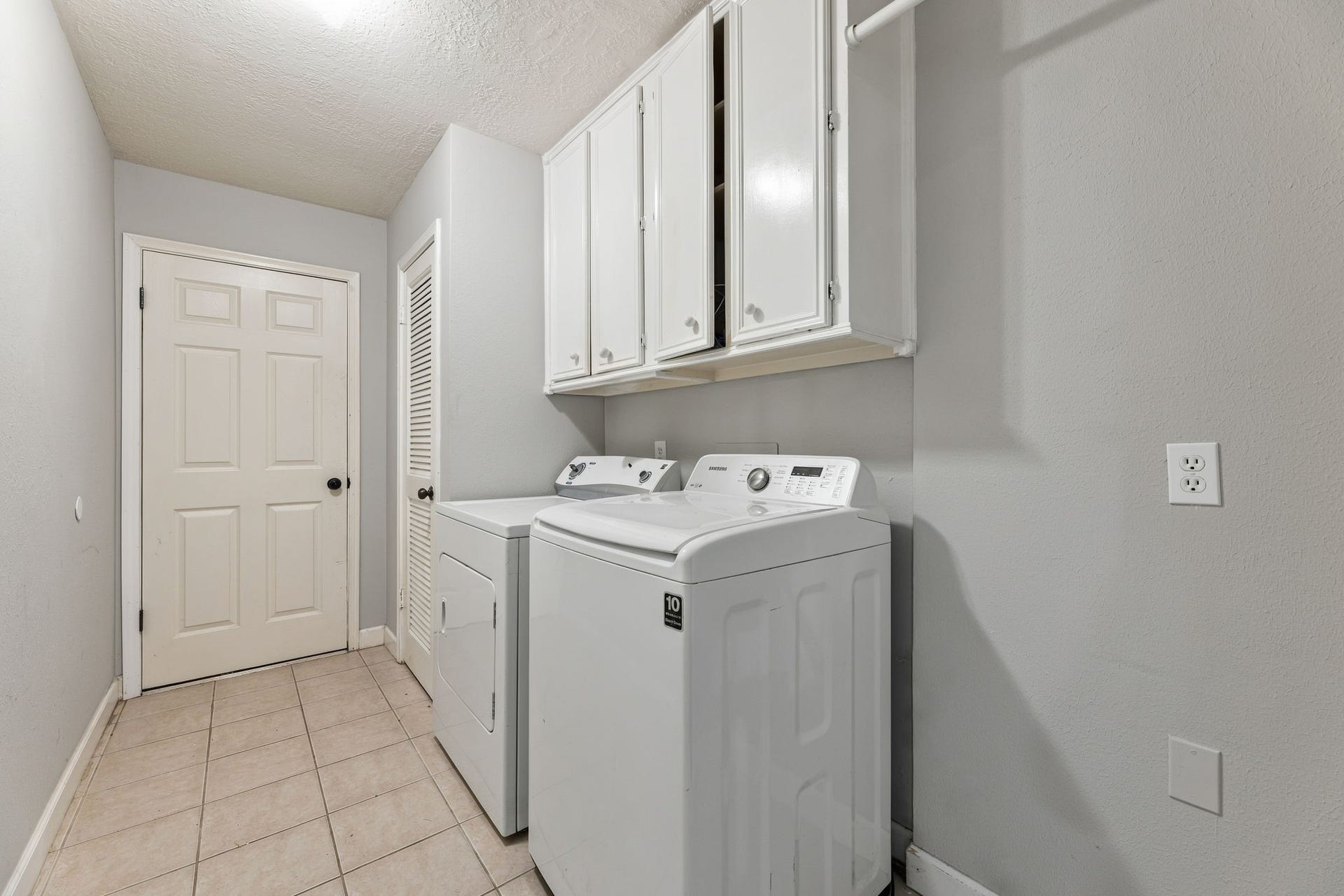 4411 Deerfield Village Drive, Houston, TX 77084 Dedicated indoor laundry room with additional storage!