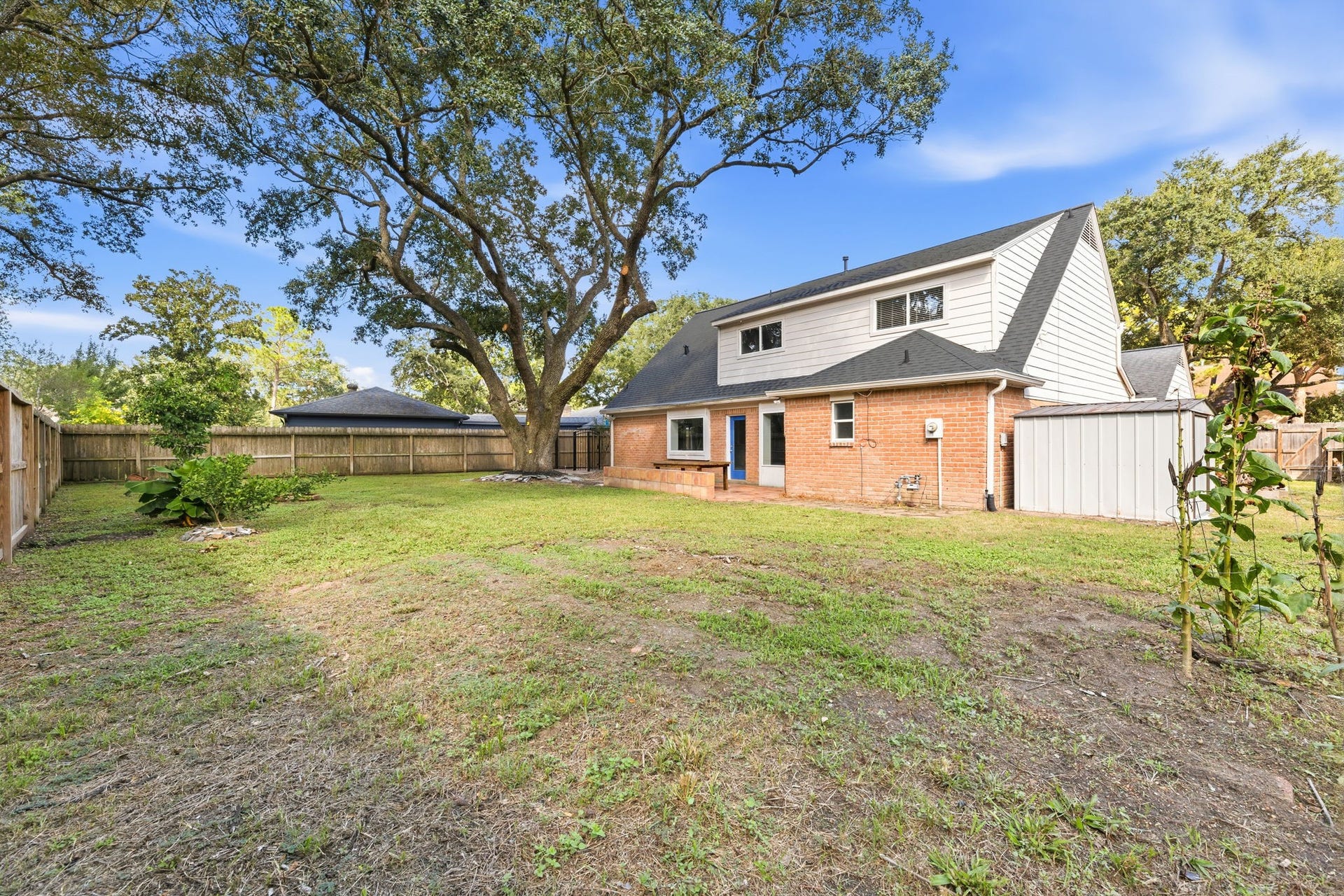 4411 Deerfield Village Drive, Houston, TX 77084 Backyard space previously used as garden. EXCELLENT soil for growing veggies!