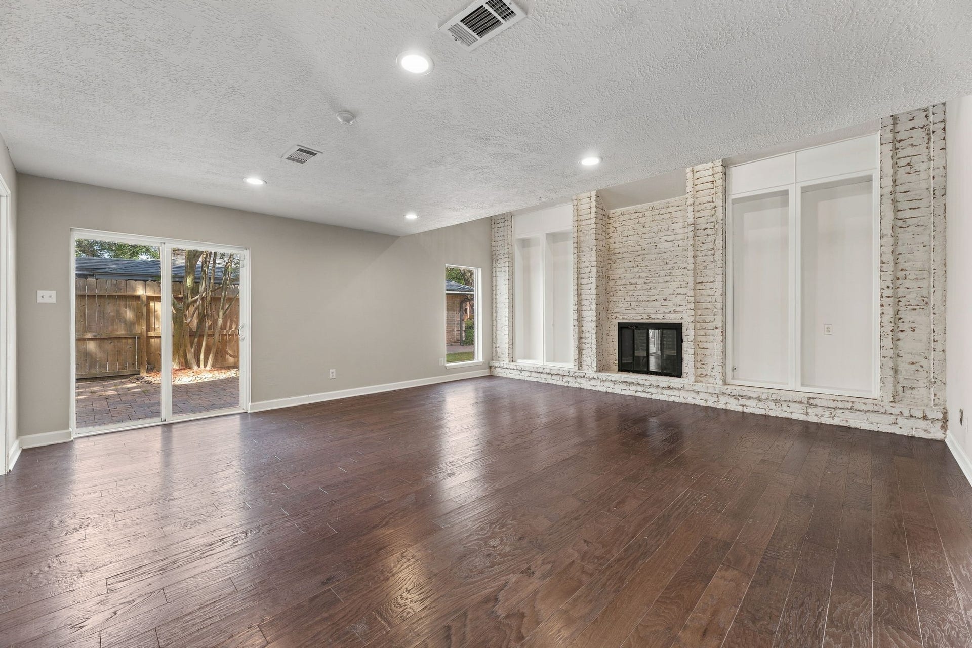 4411 Deerfield Village Drive, Houston, TX 77084 Warm and inviting living space centered around the fireplace!