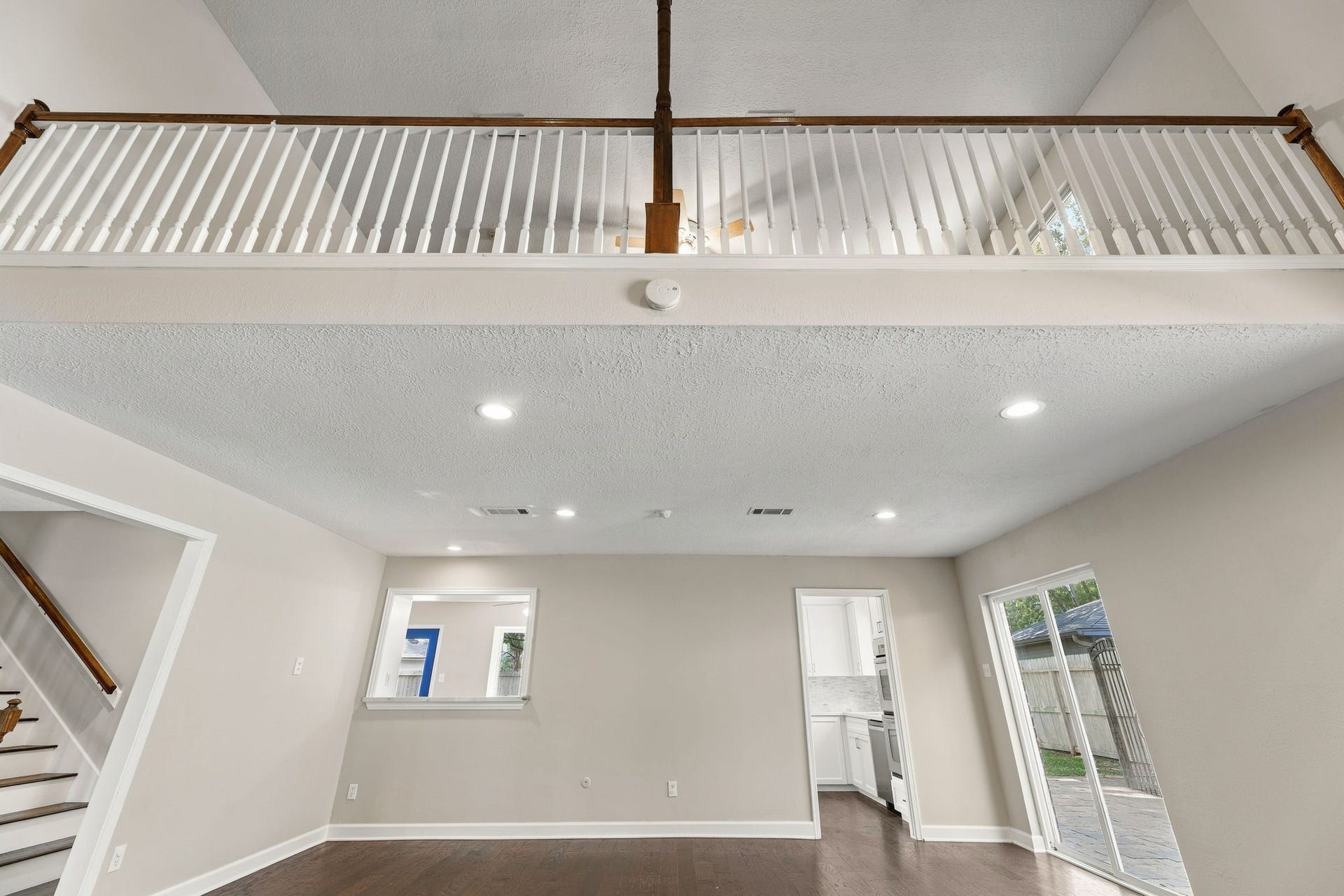4411 Deerfield Village Drive, Houston, TX 77084 Open upstairs landing overlooking the two-story living area!