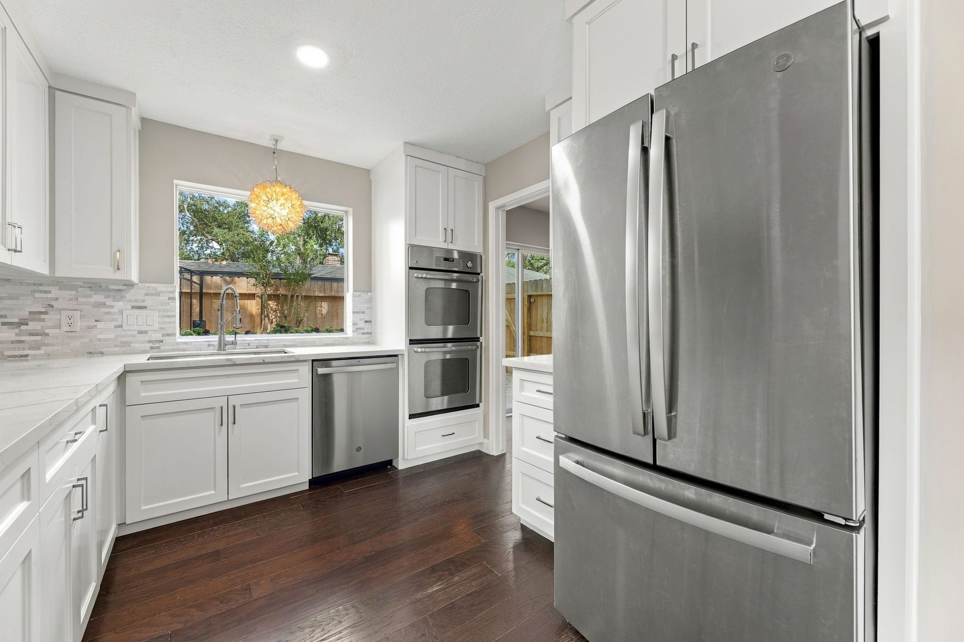 4411 Deerfield Village Drive, Houston, TX 77084 Updated kitchen with quartz countertops and stainless steel appliances!