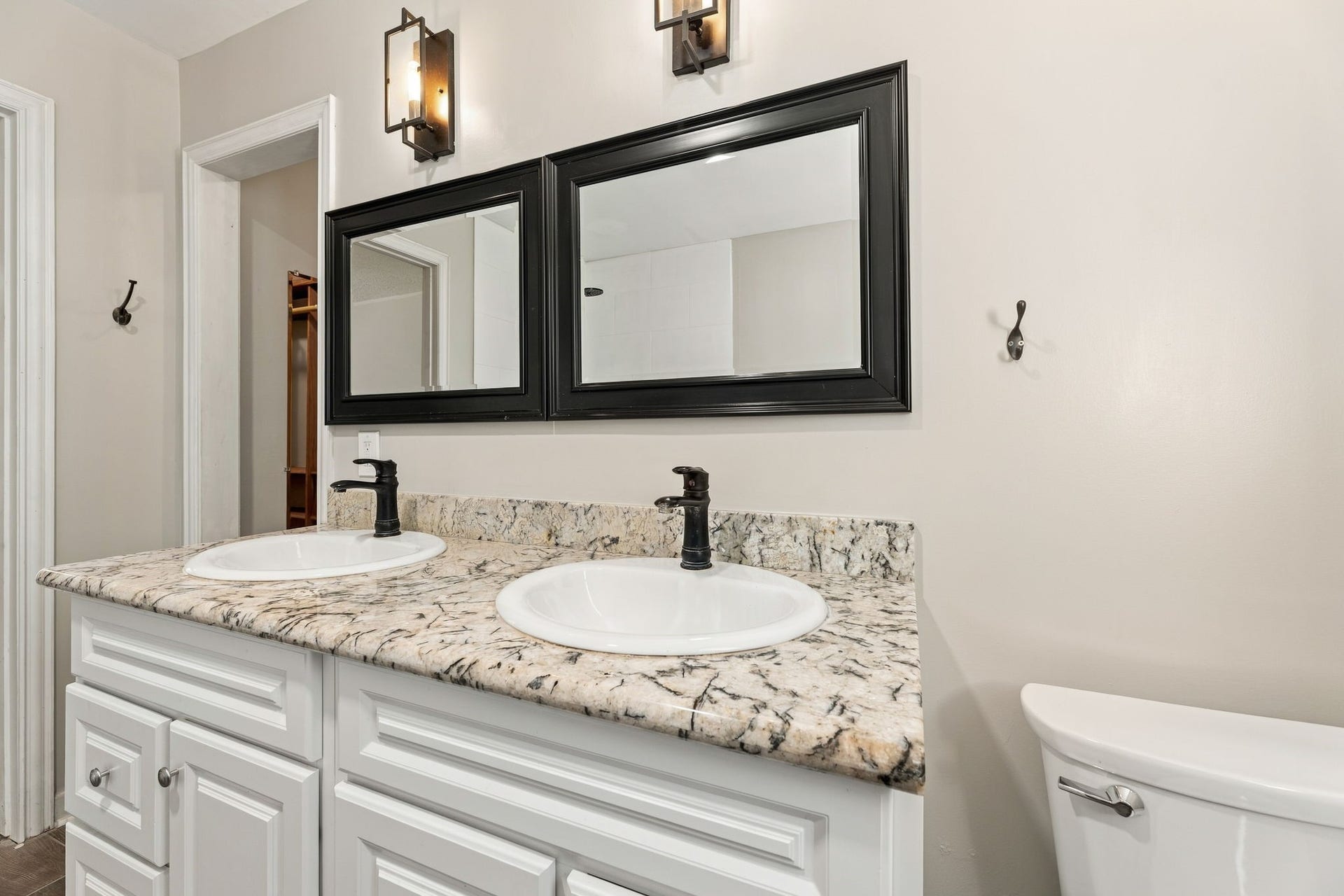 4411 Deerfield Village Drive, Houston, TX 77084 Updated primary bath with double vanity and walk-in shower!
