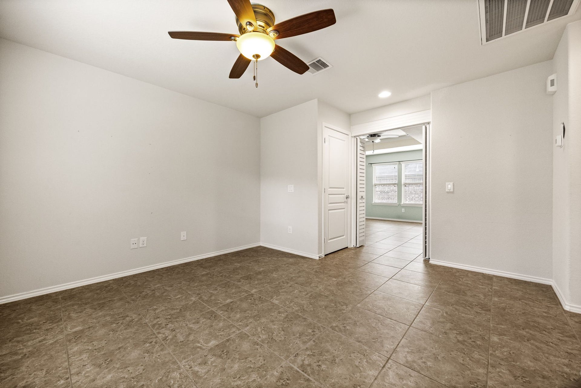 Flex space off the Living area is large and has a closet.