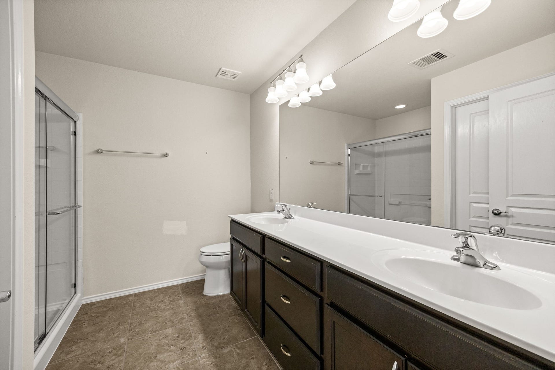 Primary bath with his and hers sinks.
