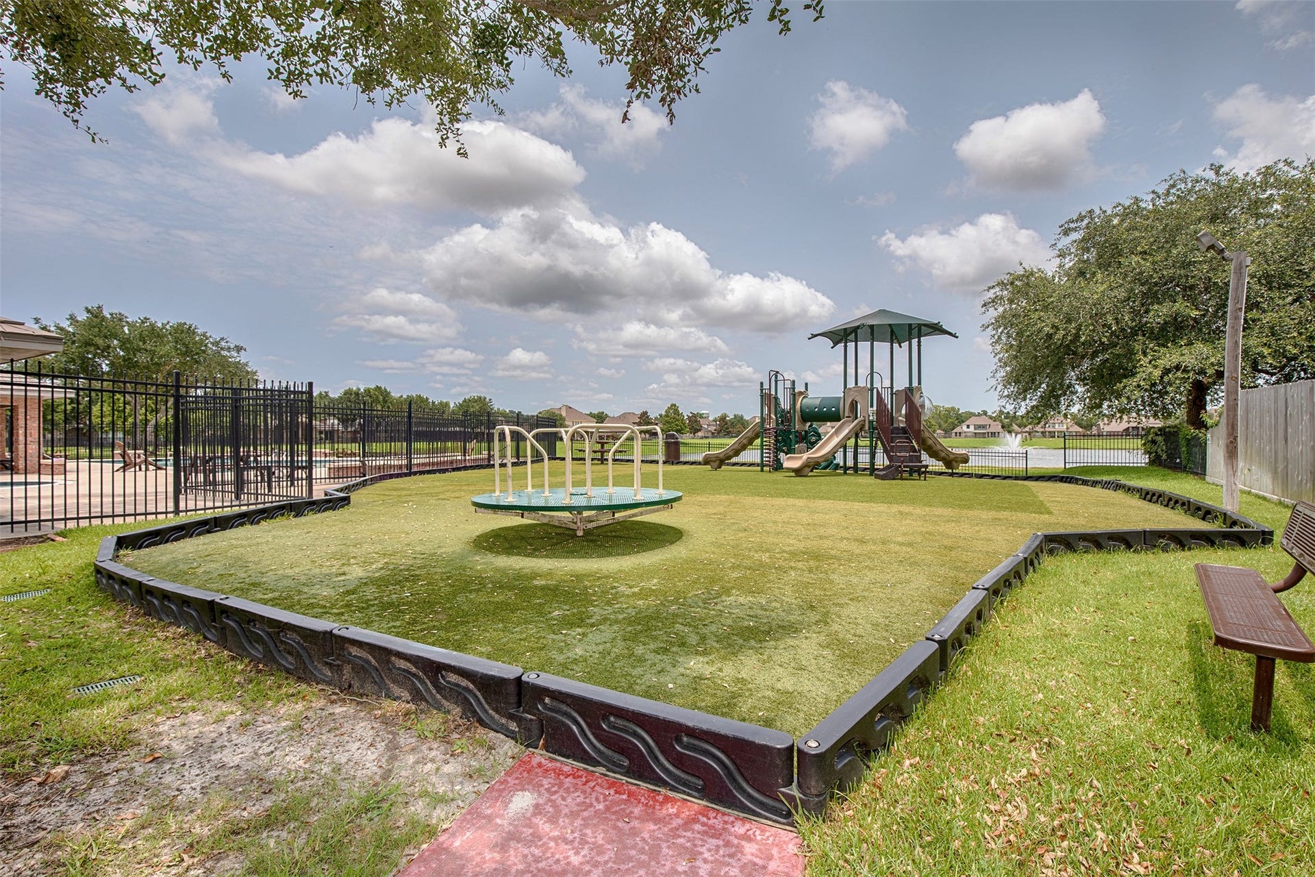 3612 Fir Hollow Way, Pearland, TX 77581 Neighborhood amenities include a community playground and open green space, providing additional opportunities to enjoy the outdoors close to home.