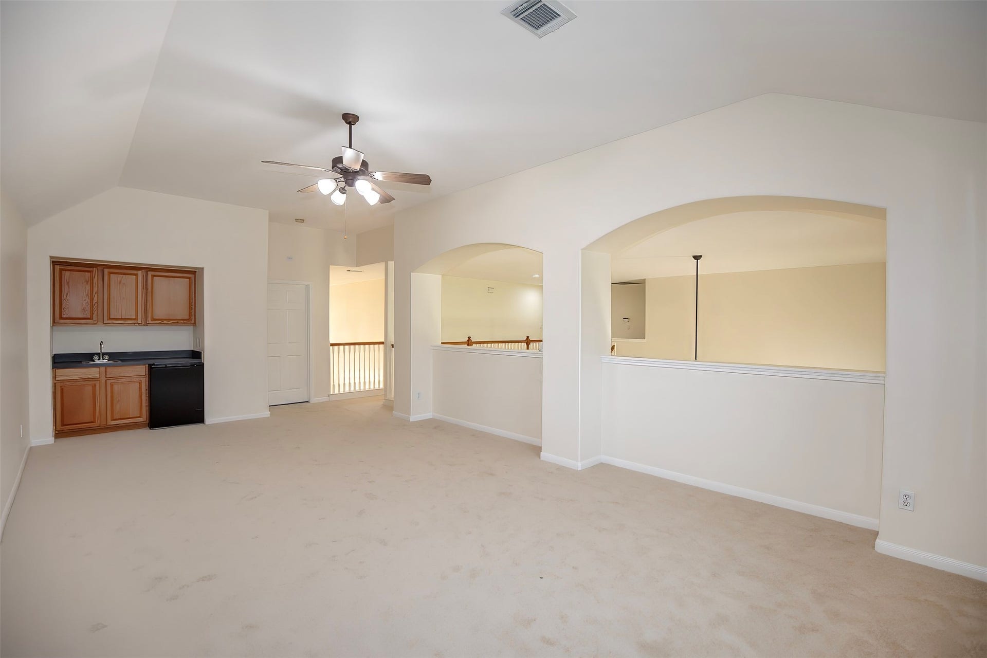 3612 Fir Hollow Way, Pearland, TX 77581 The oversized game room includes a convenient wet bar, making it an ideal space for entertaining, movie nights, or hosting guests.