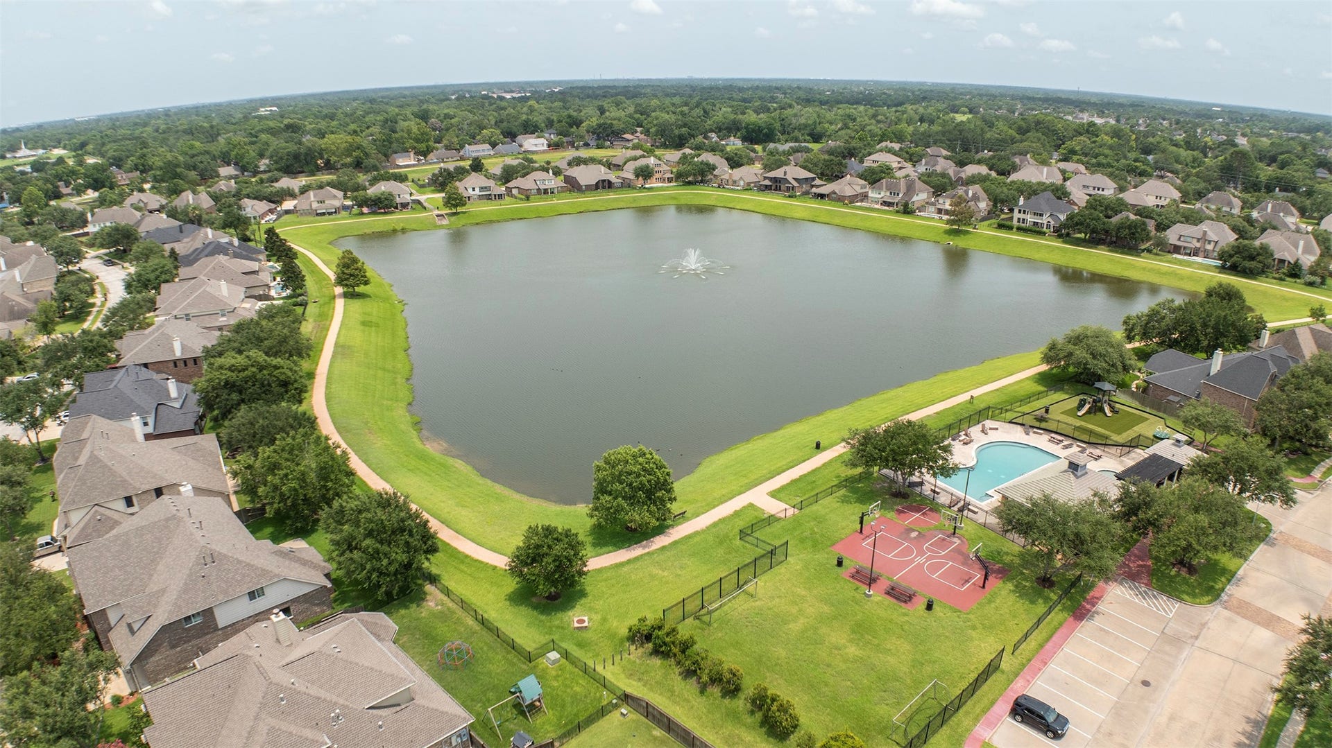 3612 Fir Hollow Way, Pearland, TX 77581 Neighborhood amenities include beautifully maintained green spaces, playgrounds, and recreation areas for residents to enjoy.