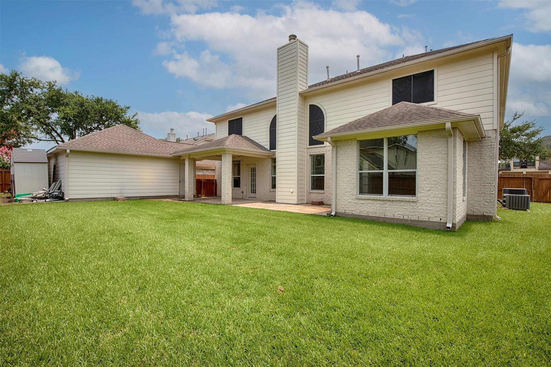 3612 Fir Hollow Way, Pearland, TX 77581 Private backyard provides space to play, garden, or create your own outdoor oasis while enjoying the covered patio.