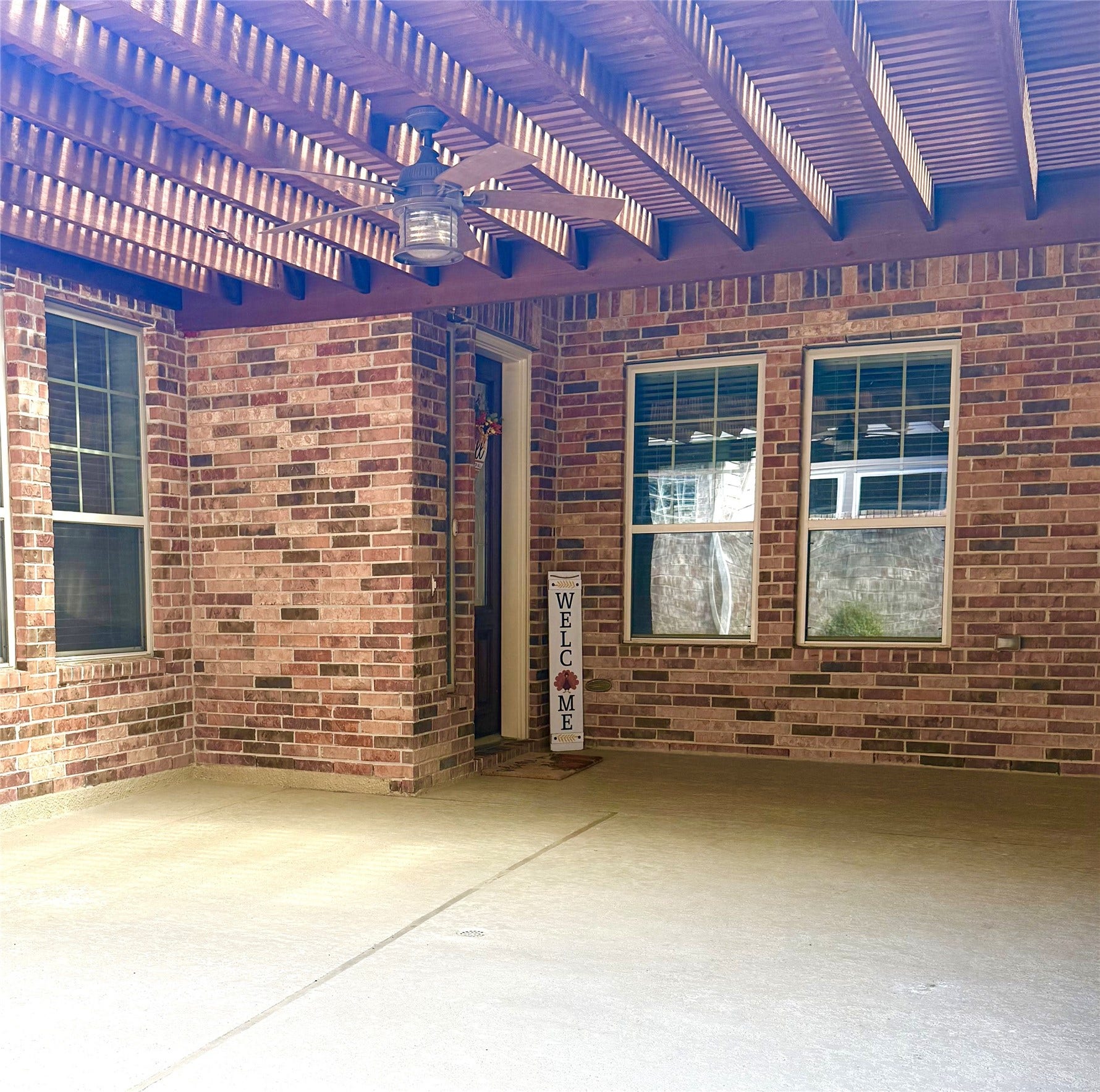 26926 Carmel Falls Lane, Katy, TX 77494 covered front court yard with fireplace