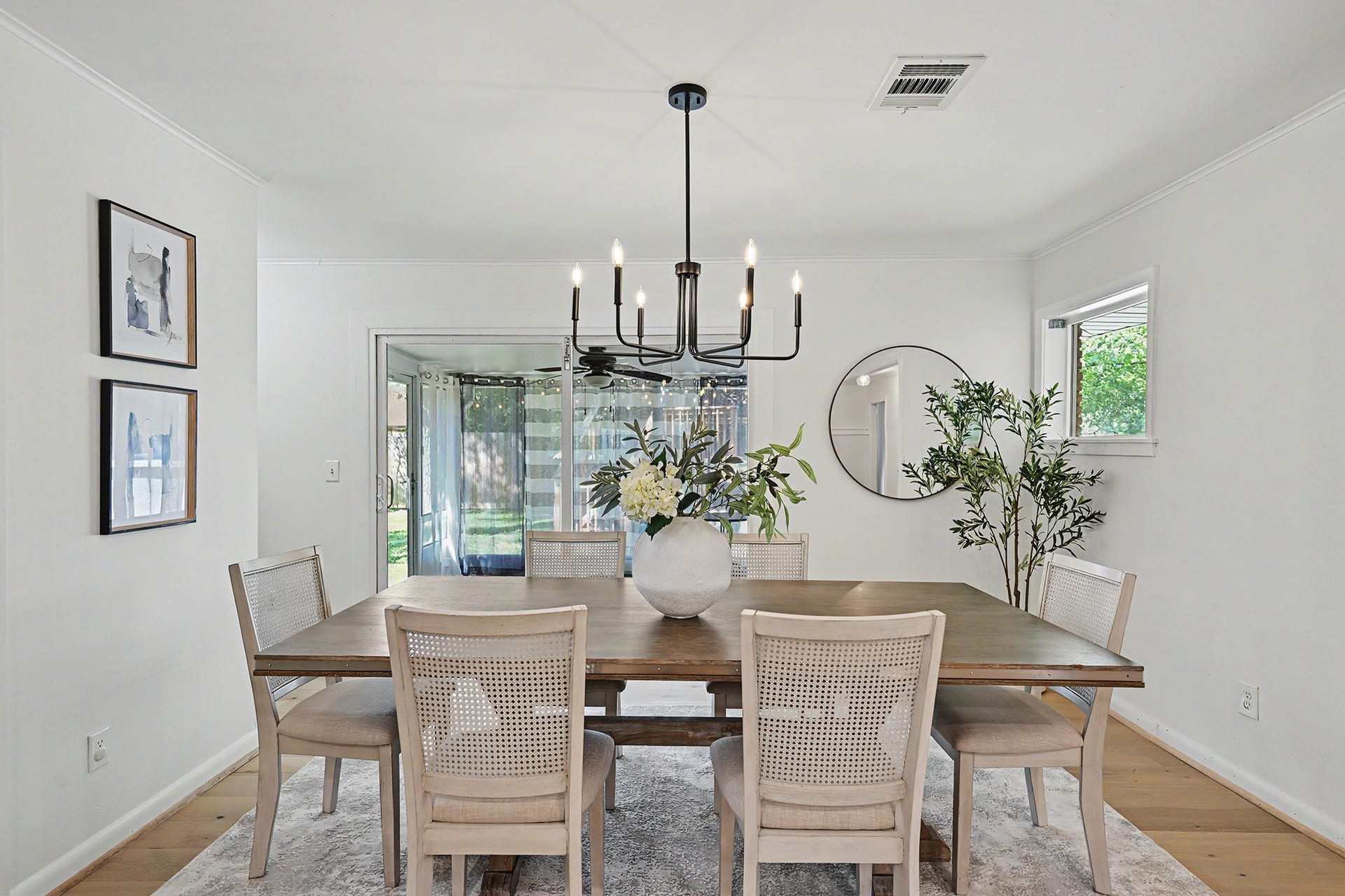 Dining area opens to the screened-in porch