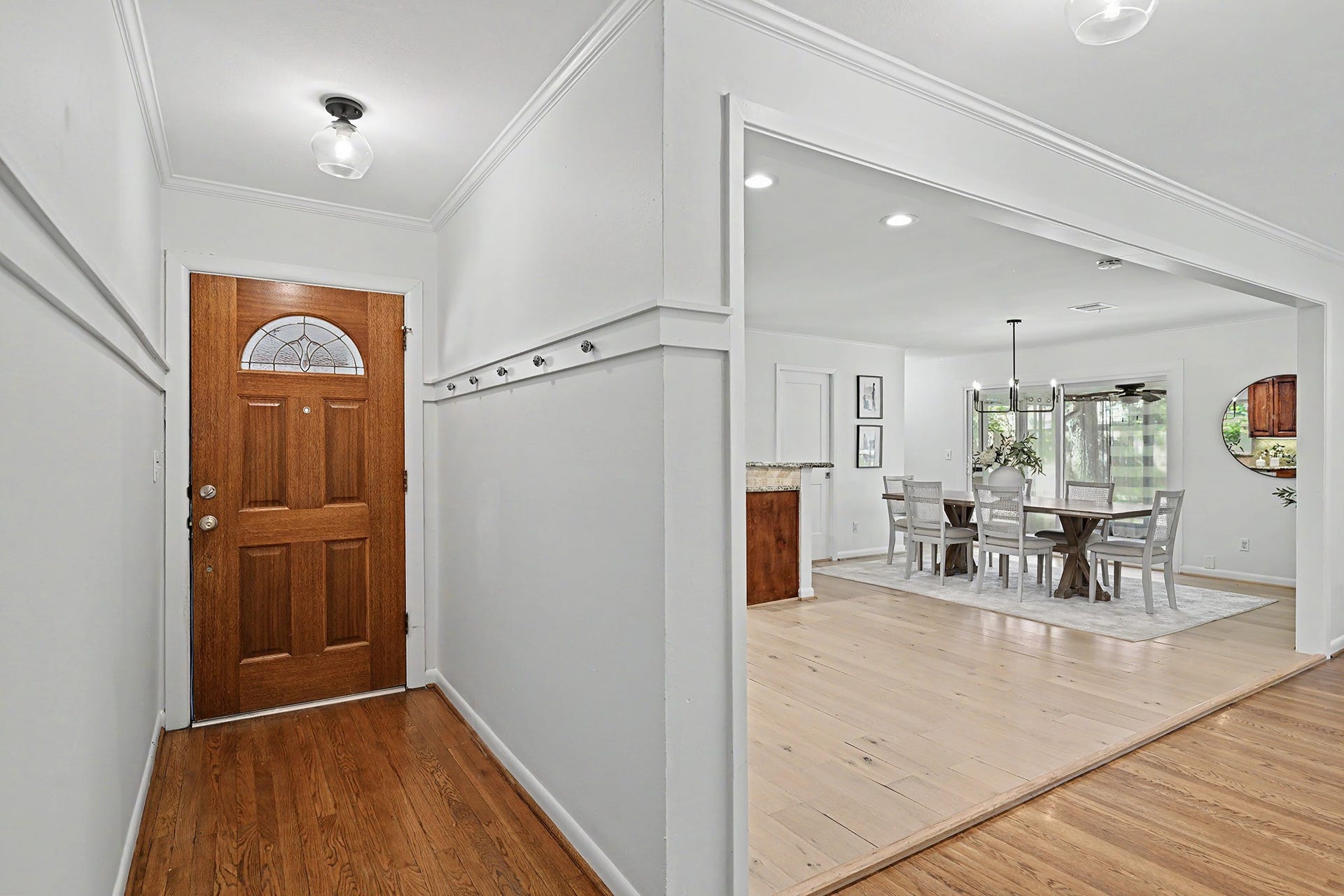 Offset entryway provides privacy and a drop zone for bags/coats