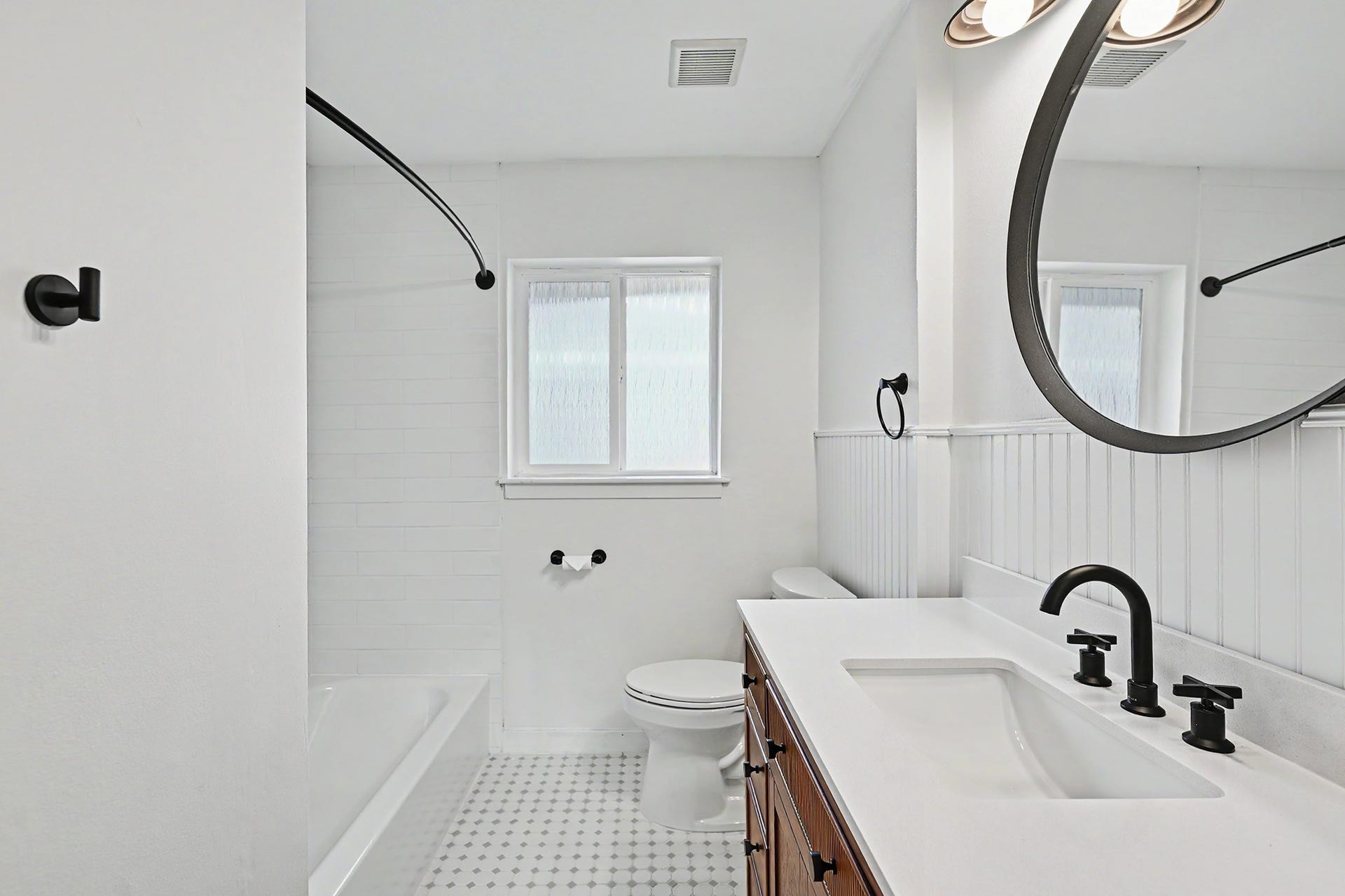 Remodeled hall bath with tub/shower combo