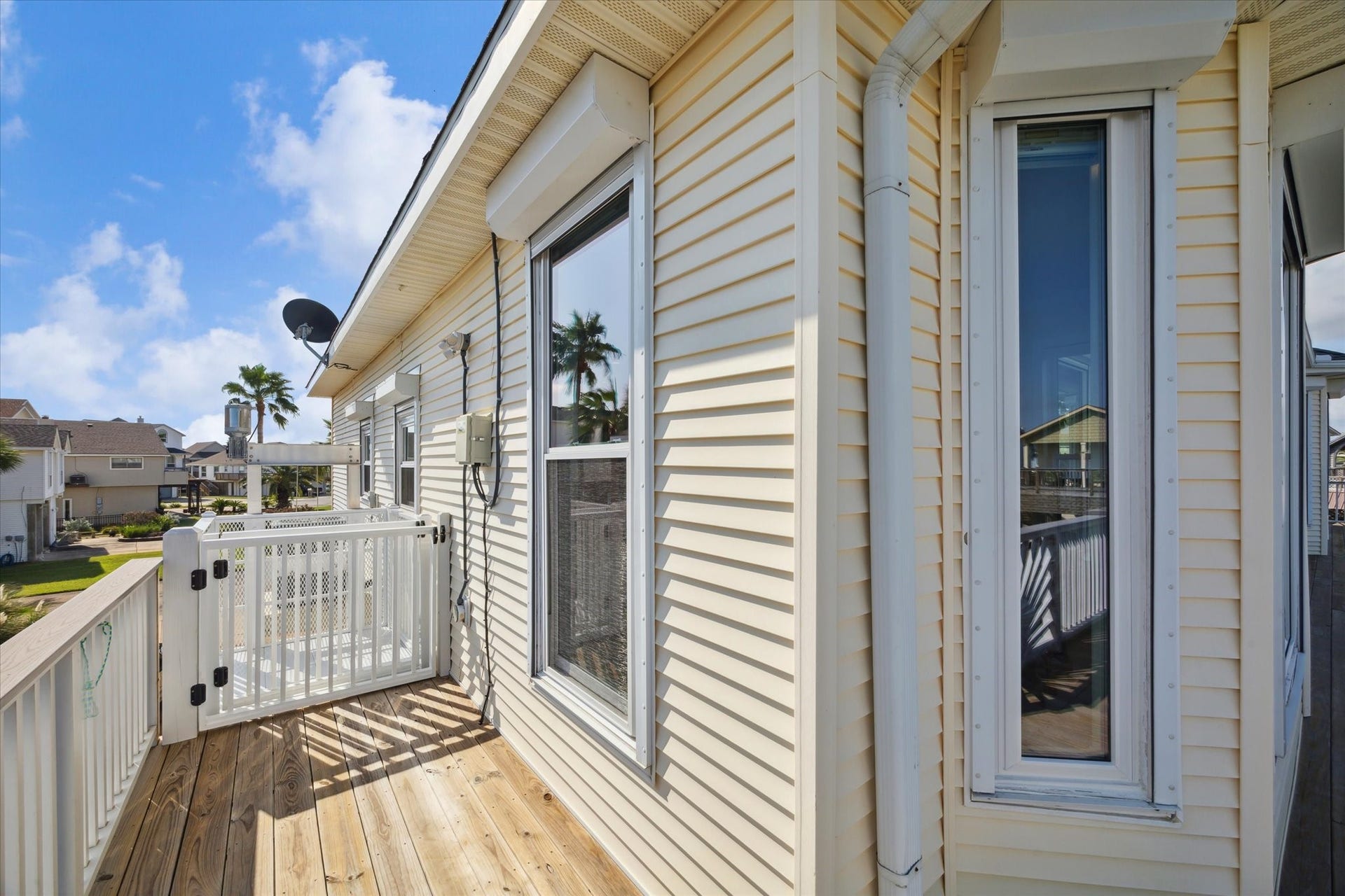 102 Bamaku Bend, Tiki Island, TX 77554 Located at the end of the deck is your lift which goes from the ground level next to the garage to the second level deck making bringing groceries inside convenient and easy!