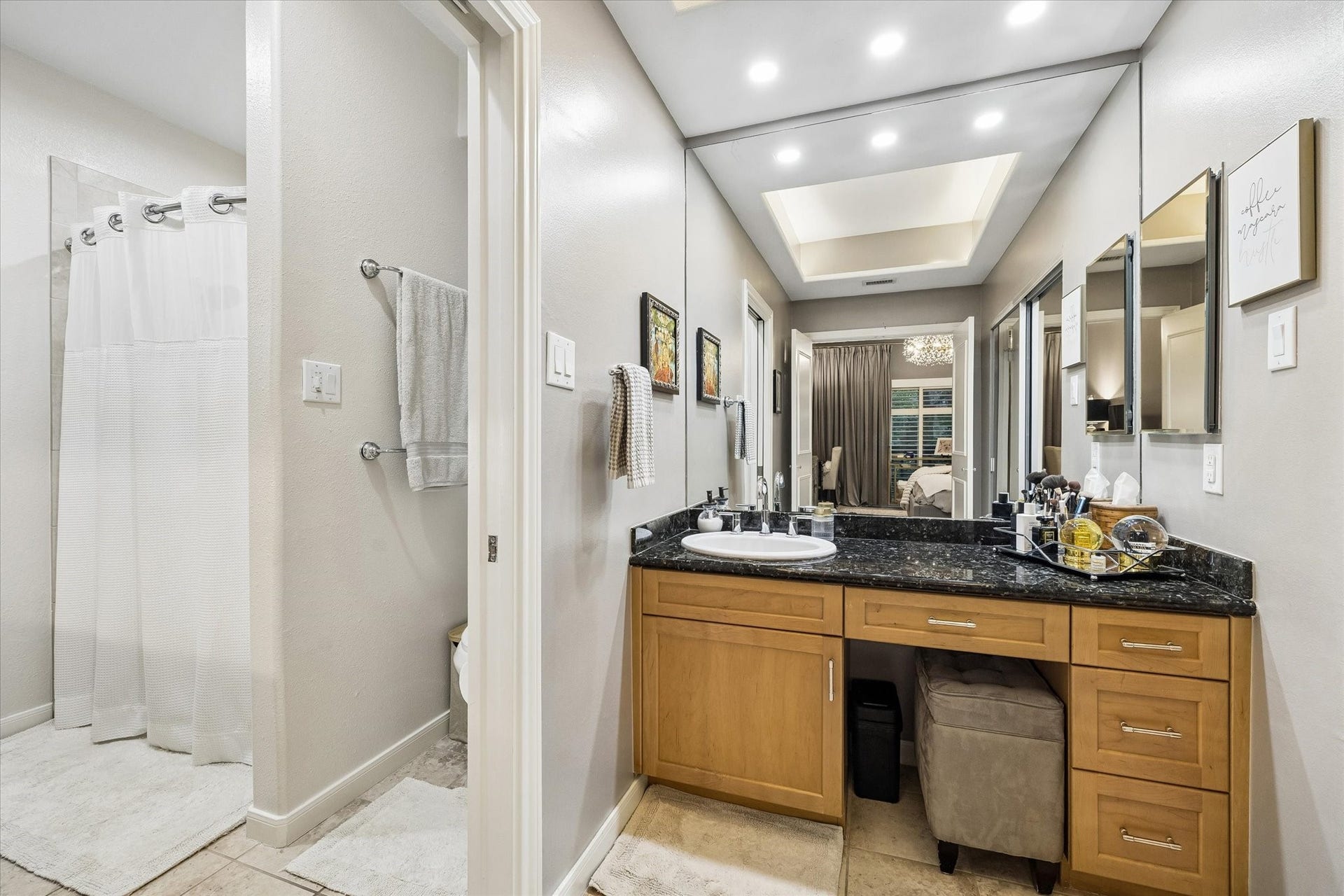 Primary bath with vanity area and tub/shower