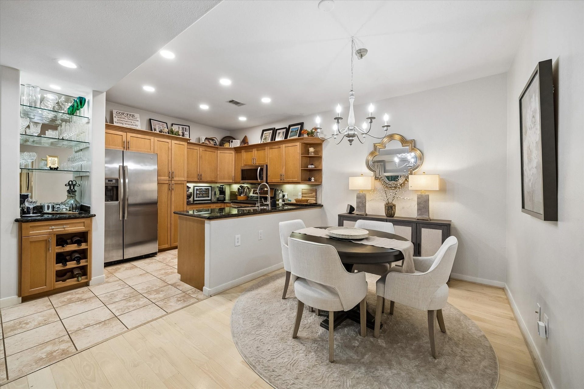 Dining room and open kitchen with bar area