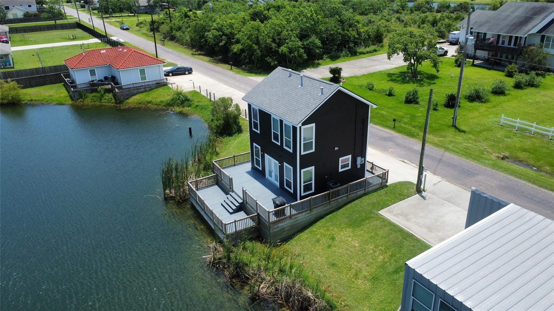 2730 Avenue D, San Leon, TX 77539 this photo was taken before current owner. It is just showing what the deck looked and size like before covering