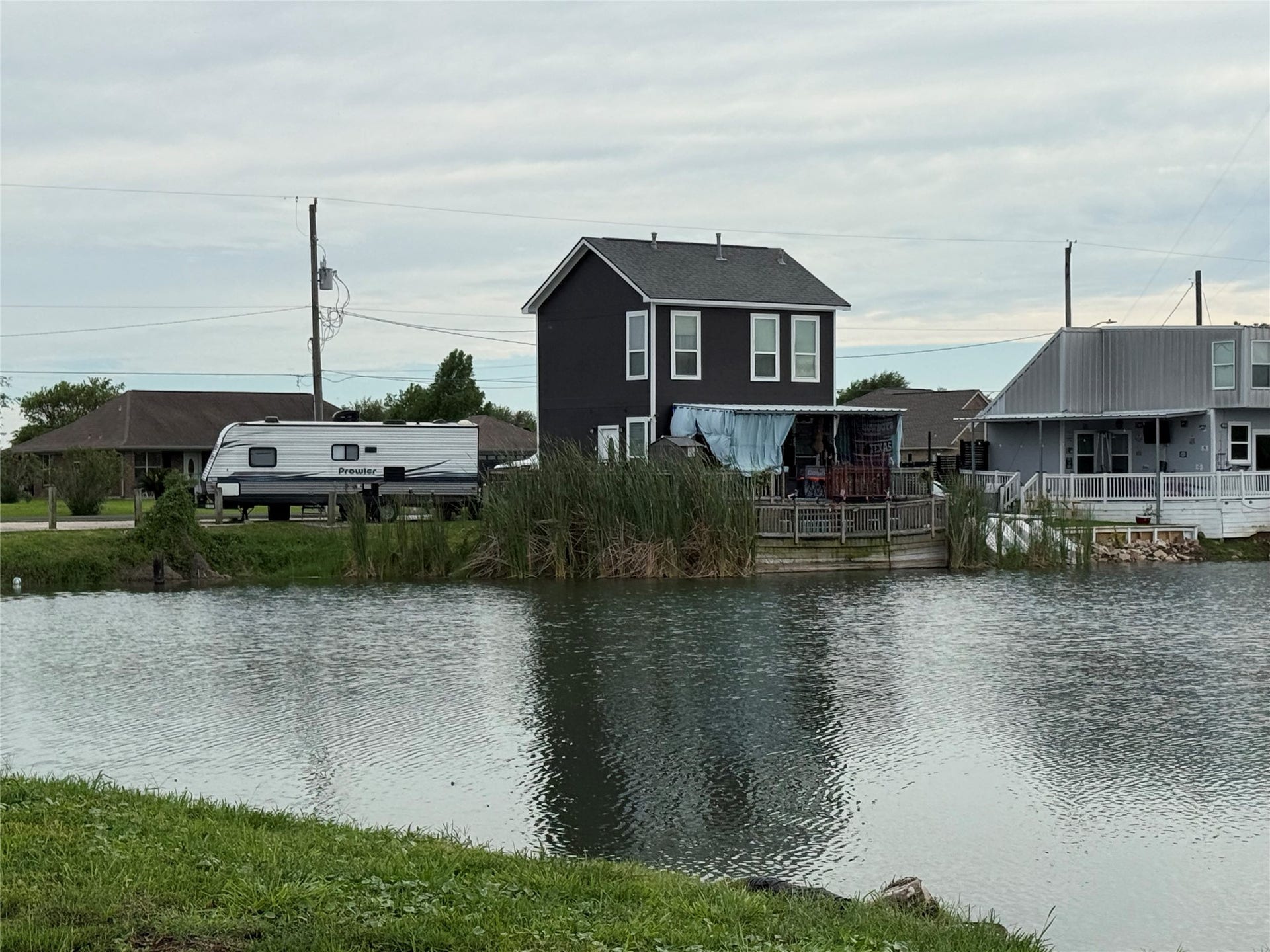 2730 Avenue D, San Leon, TX 77539 current view of back of the house