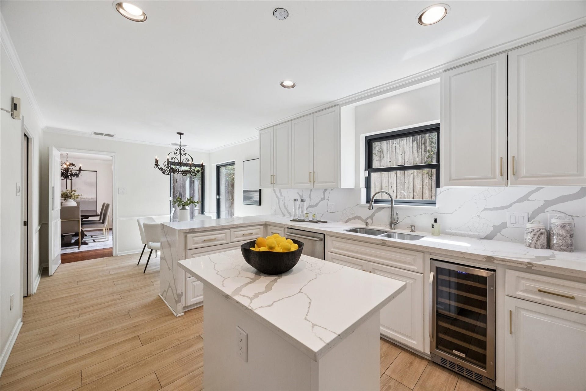 2422 Nantucket Drive, #C, Houston, TX 77057 Freshly updated Kitchen with wine
chiller, induction cooktop, custom
vent hood and waterfall quartz
counter tops!