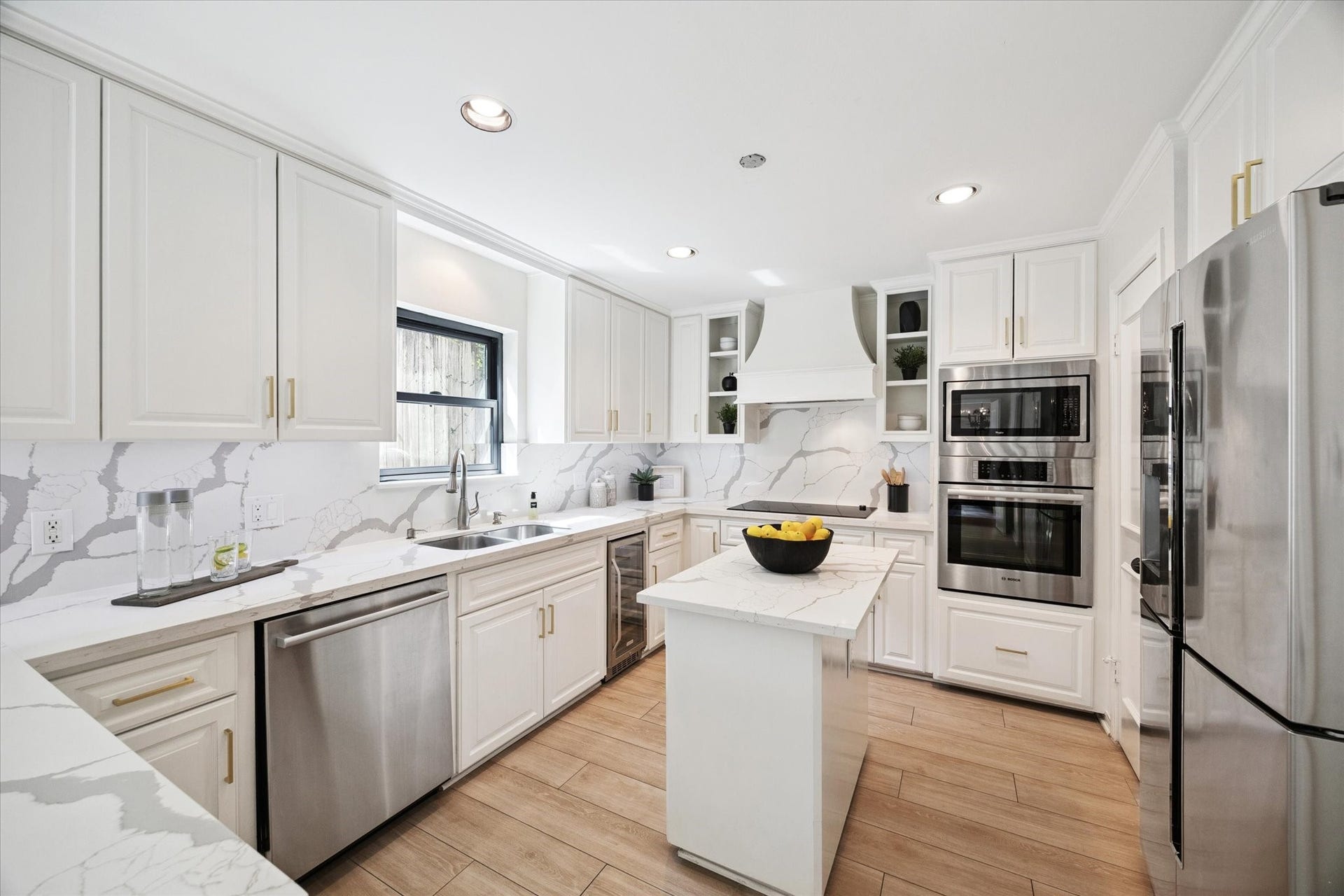 2422 Nantucket Drive, #C, Houston, TX 77057 Another view of remodeled kitchen:
Custom cabinetry, top of the line
appliances, quartz counter tops &
backsplash.
