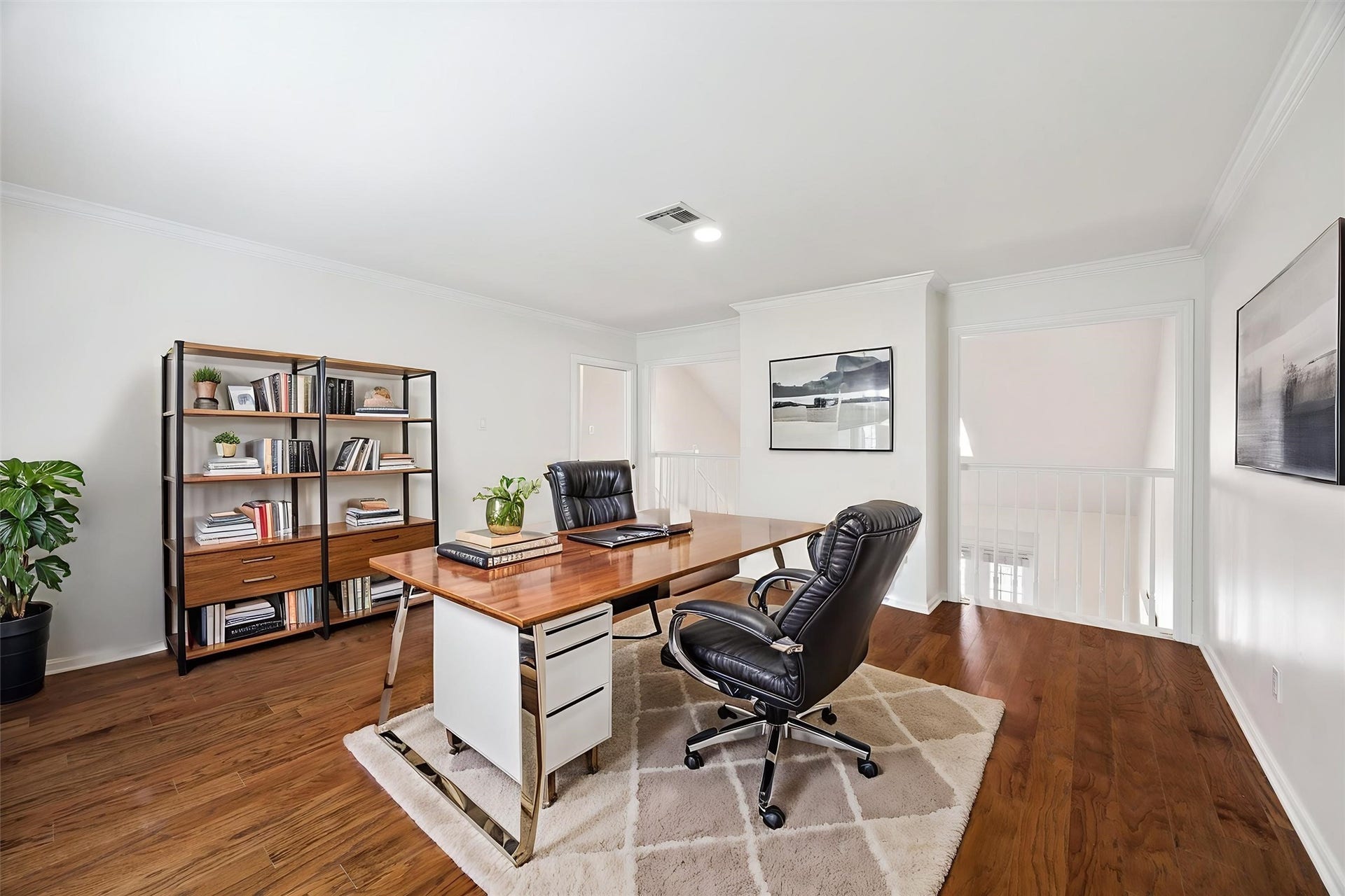 2422 Nantucket Drive, #C, Houston, TX 77057 Bedroom: 15 x 14. Rich hardwoods.
Bifold doors can be reinstalled for
privacy. This room can either be an office, bedroom, or playroom, really anything you may need. It has two minstrels balcony looking down onto the living room on the first floor. It is virtually staged.