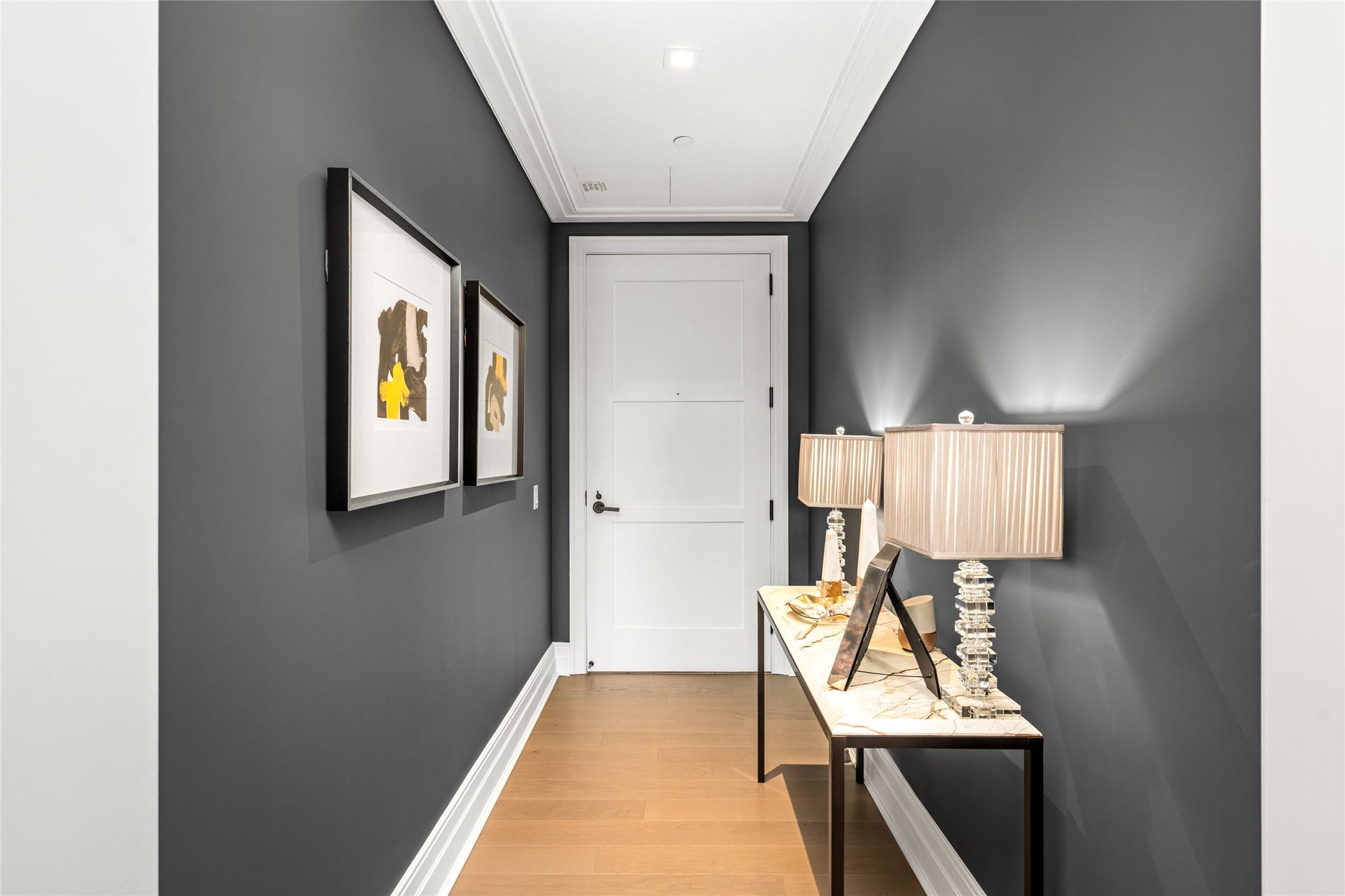6017 Memorial, #202, Houston, TX 77007 Unit 202 opens to a charming hallway, offering a warm introduction to an upscale setting.