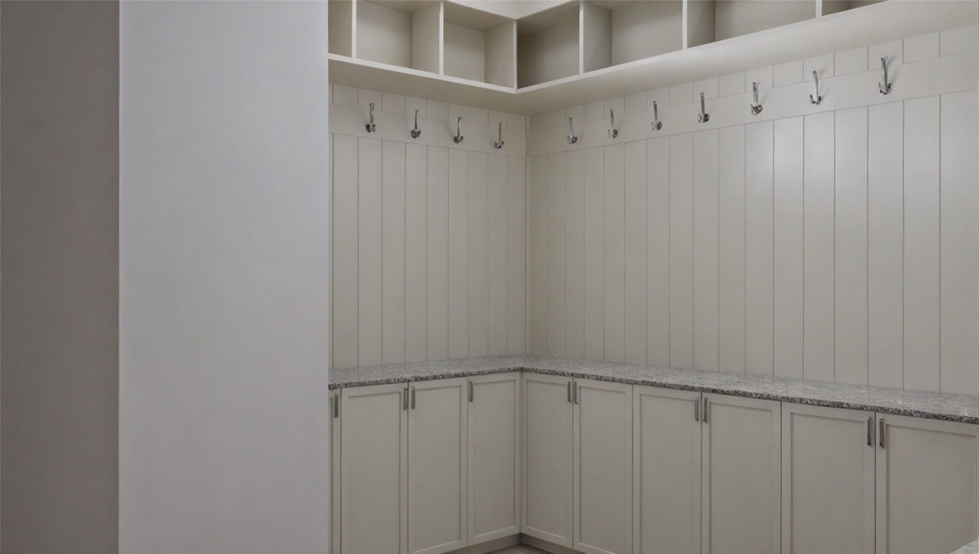 The mud room/drop zone offers a great space to store backpacks, shoes, and sports equipment as you enter the home.