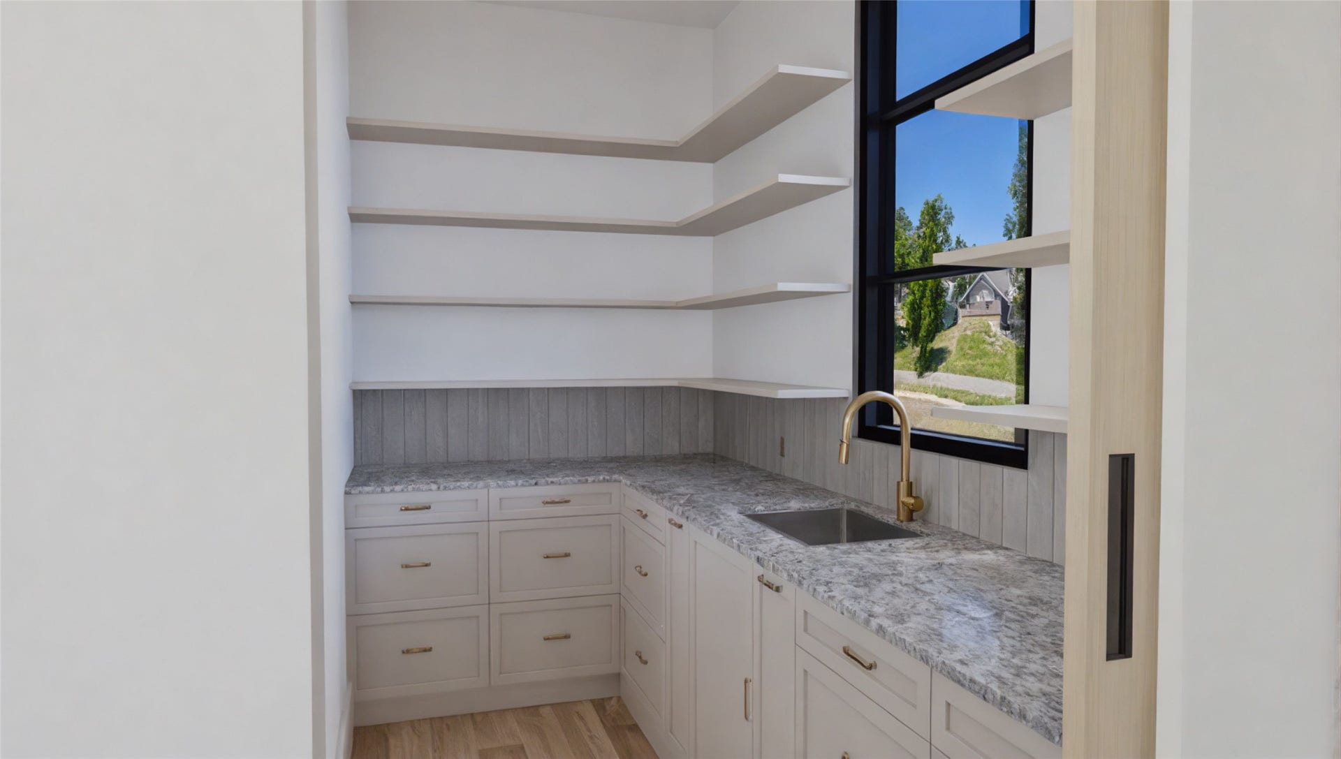 Spacious scullery-style kitchenideal for entertaining while keeping food prep and clean-up out of sight.