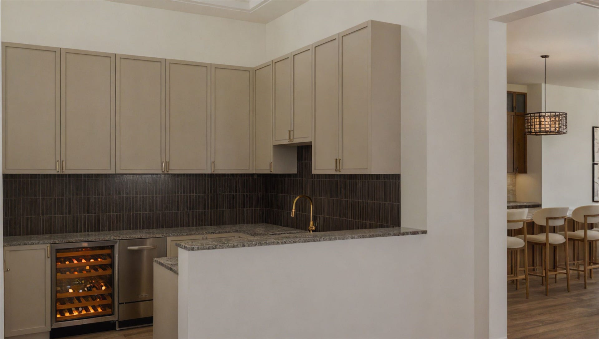 The wet bar doubles as a wine grotto off the dining room.