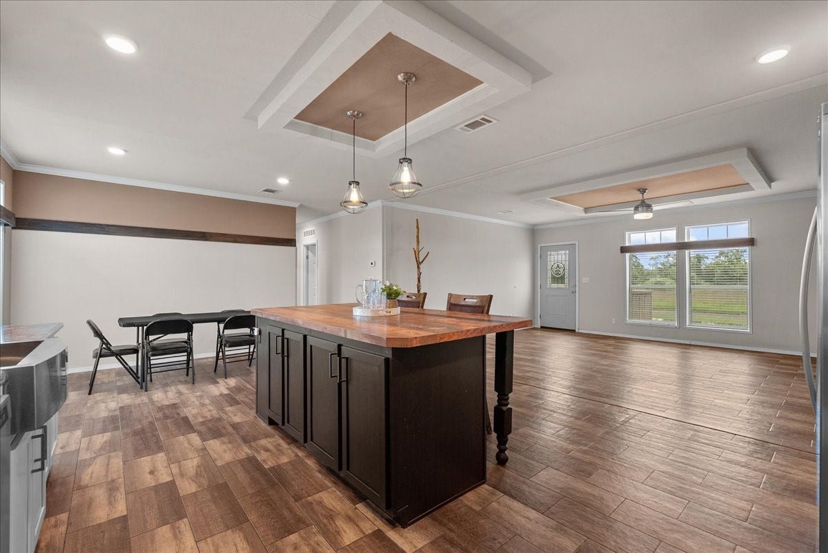 8710 Fm 646 Road S, Santa Fe, TX 77510 The roomy kitchen offers ample cabinet space, making organization and storage a breeze