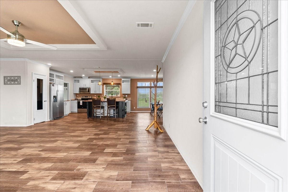 8710 Fm 646 Road S, Santa Fe, TX 77510 Step inside to a welcoming entry that flows into the spacious living room