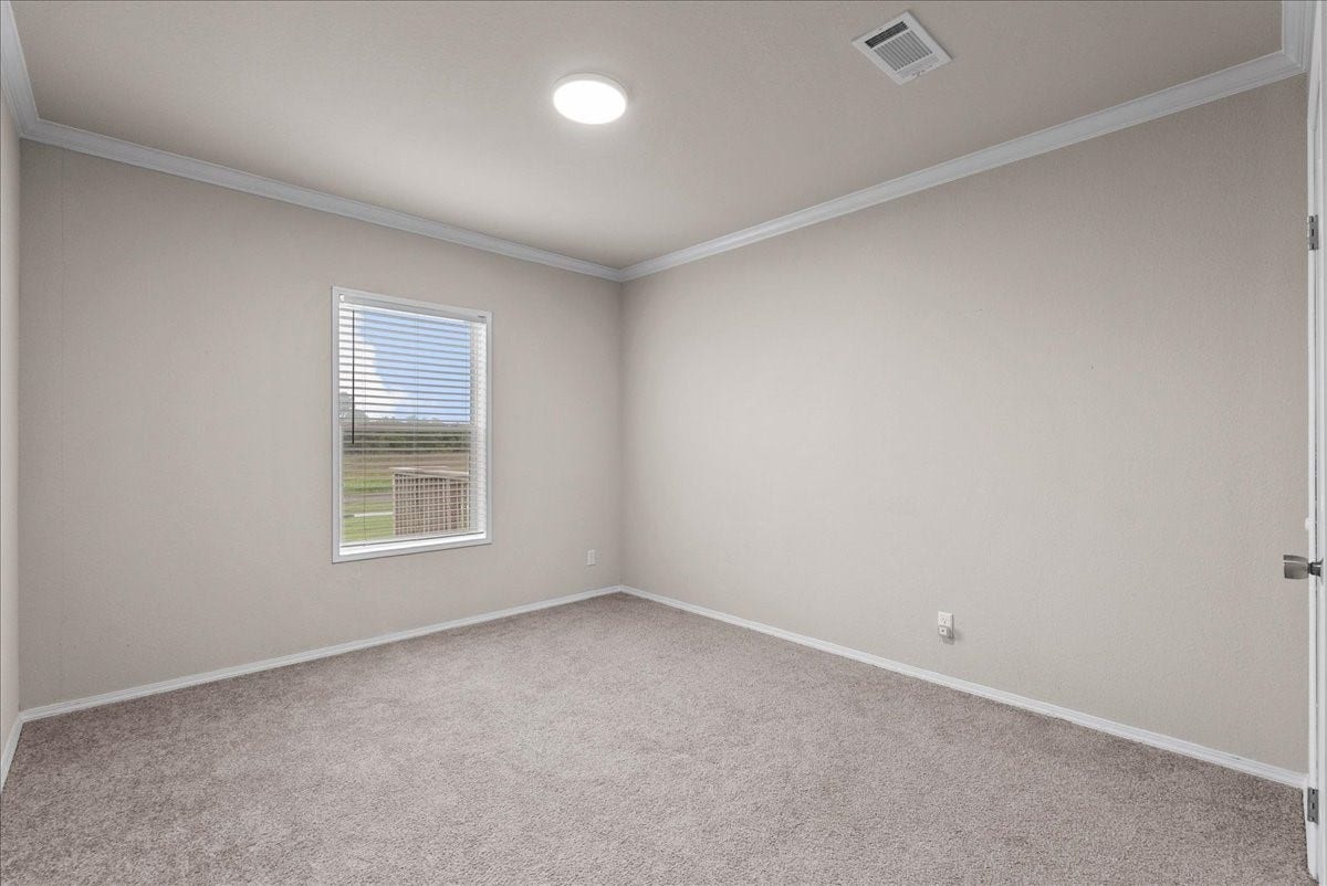 8710 Fm 646 Road S, Santa Fe, TX 77510 Second bedroom featuring ample natural lighting