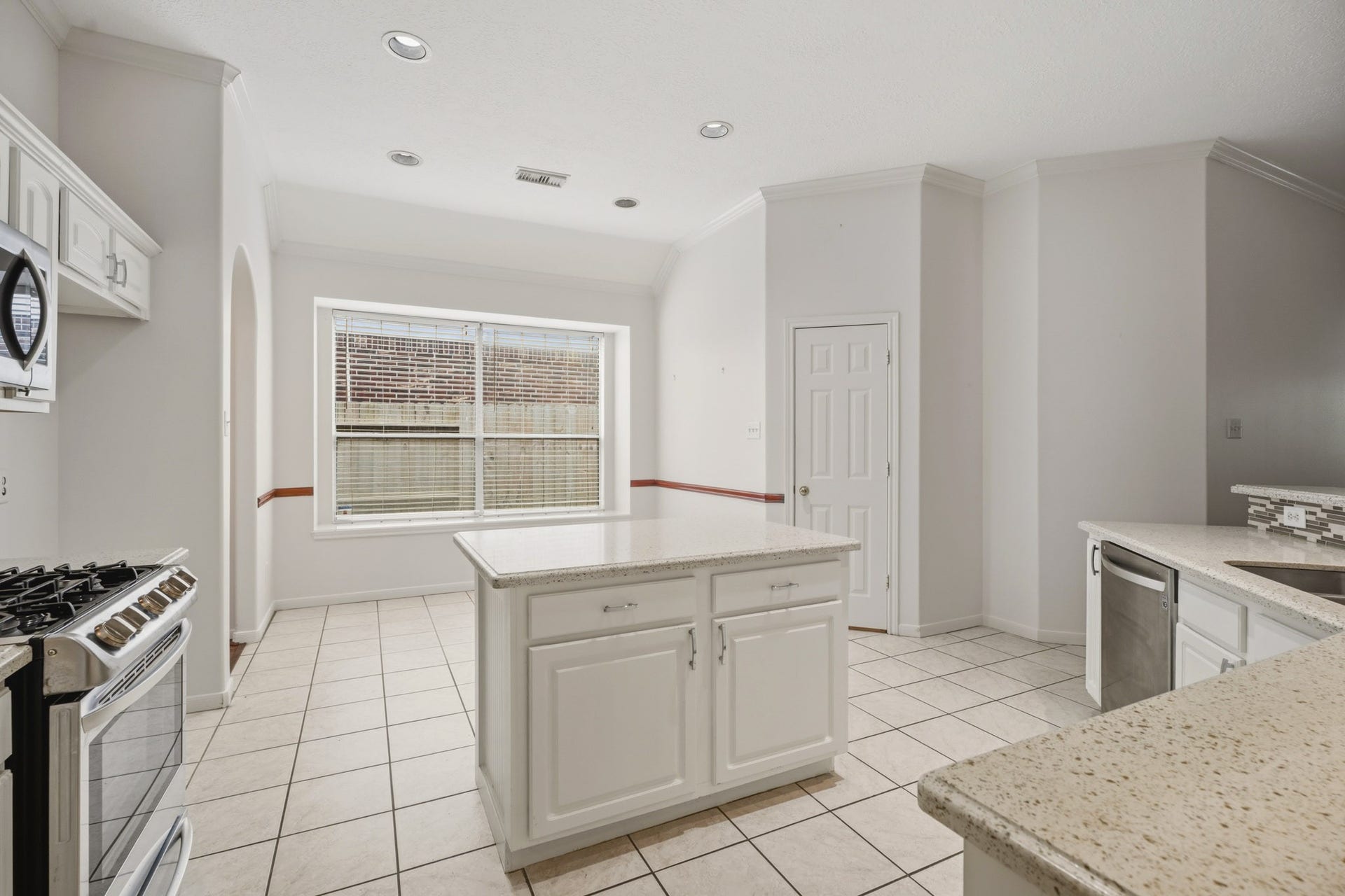 4814 Preston Trails Lane, Pasadena, TX 77505 Island kitchen and breakfast nook