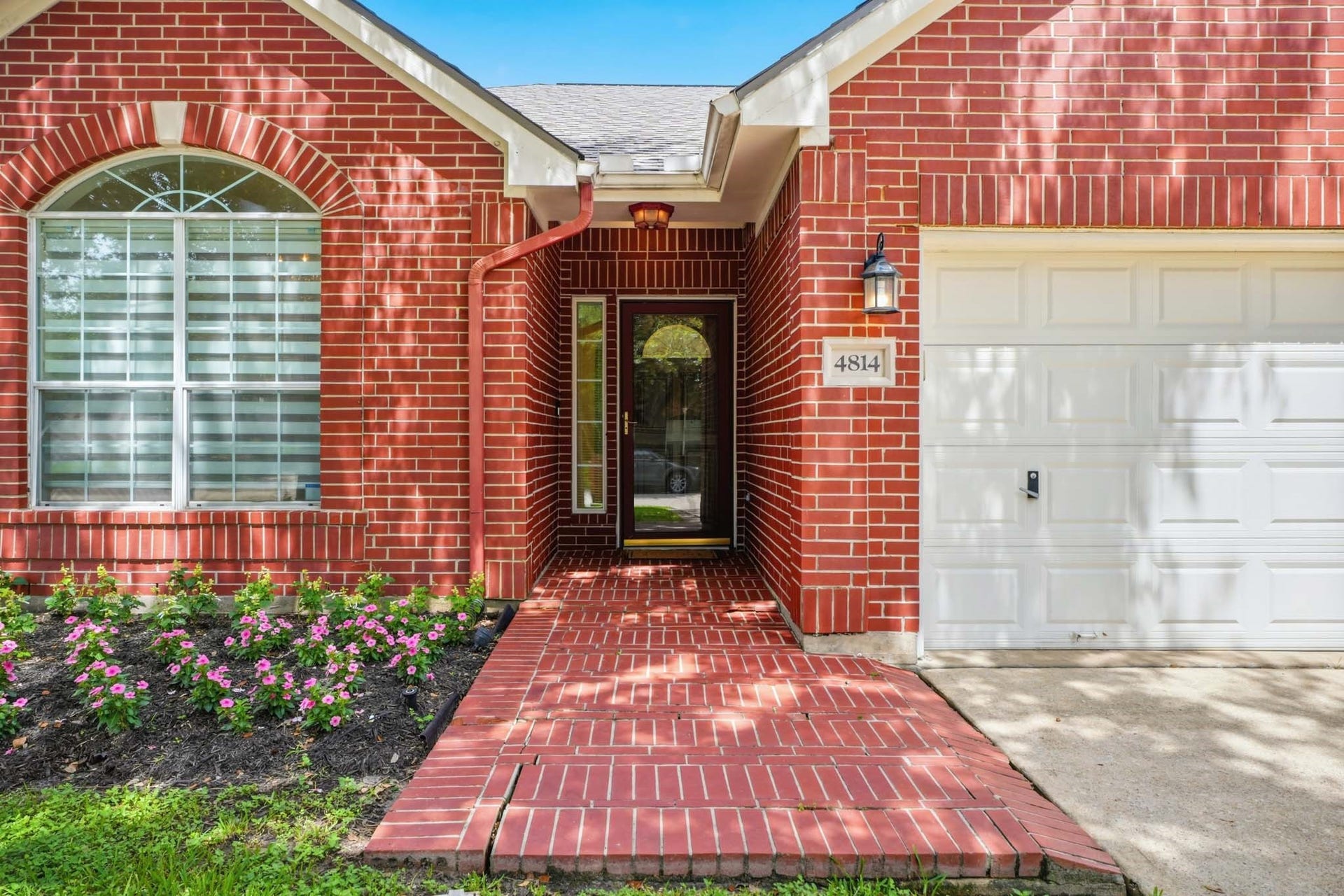 4814 Preston Trails Lane, Pasadena, TX 77505 Newly Mulched and flowered beds- sprinklers