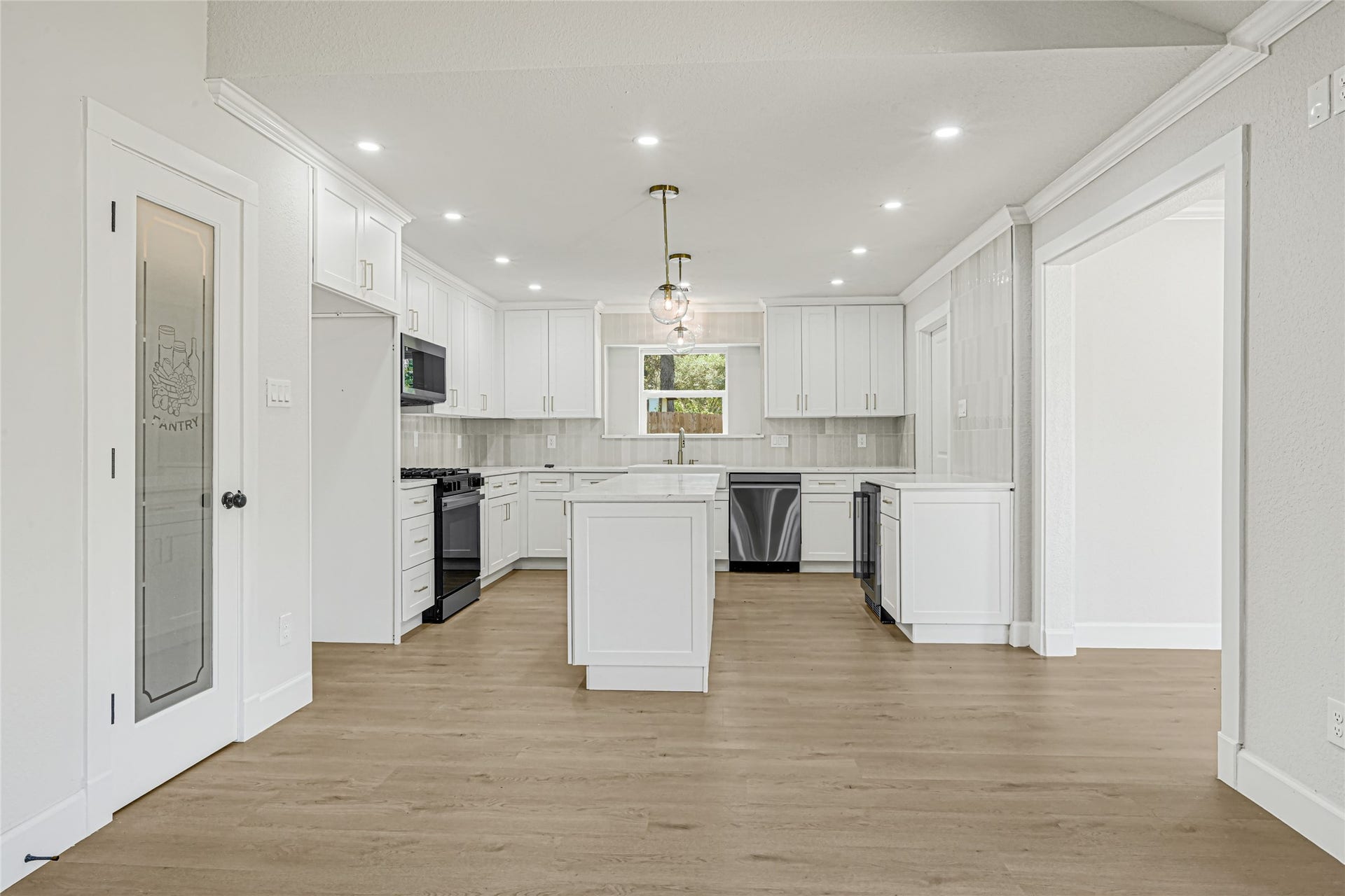 Kitchen opens to the living room